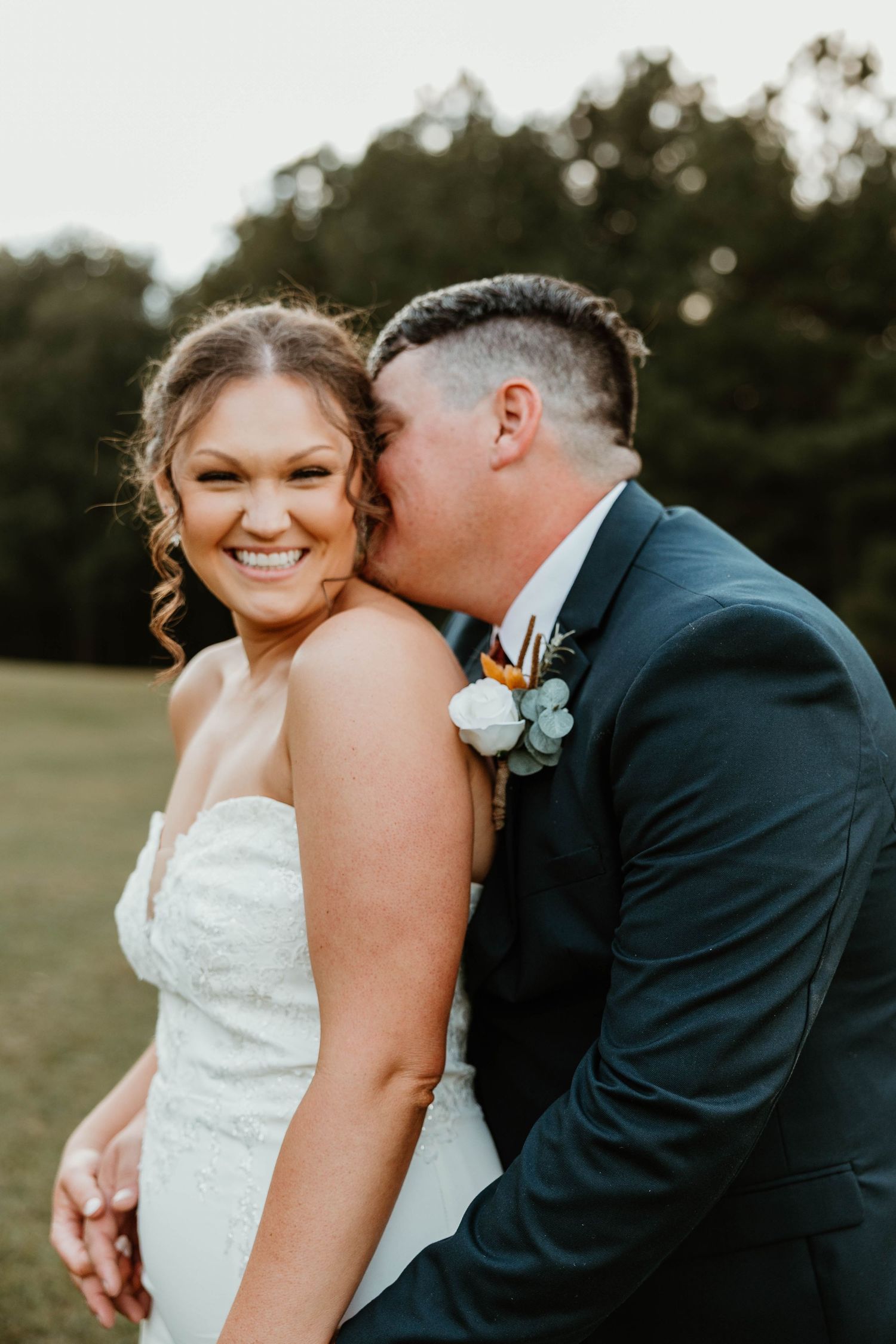 Romantic wedding photos capturing intimate moments between newlyweds in a natural outdoor setting.