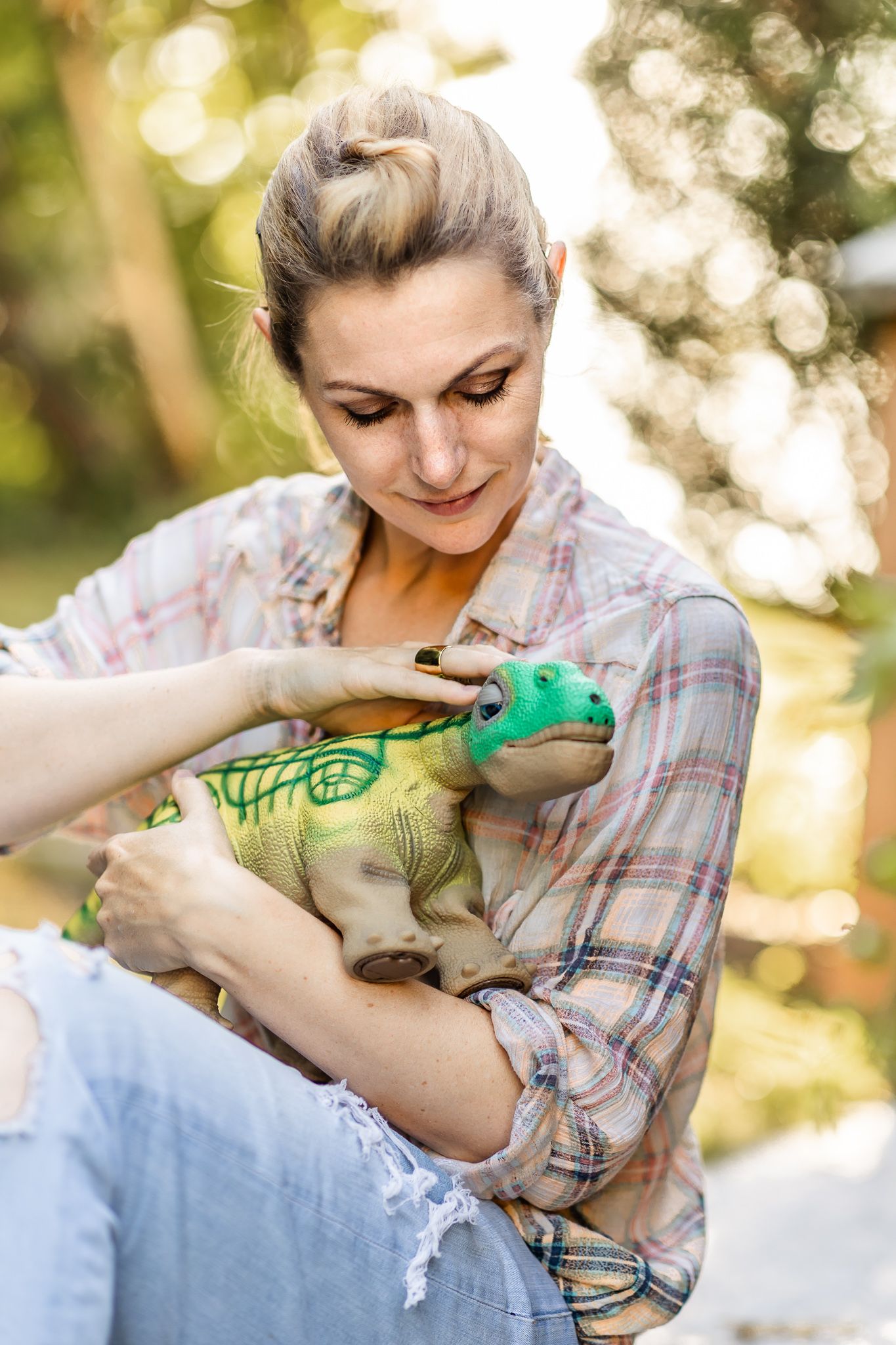 Dr. Kate Darling lovingly holds her pleo robot