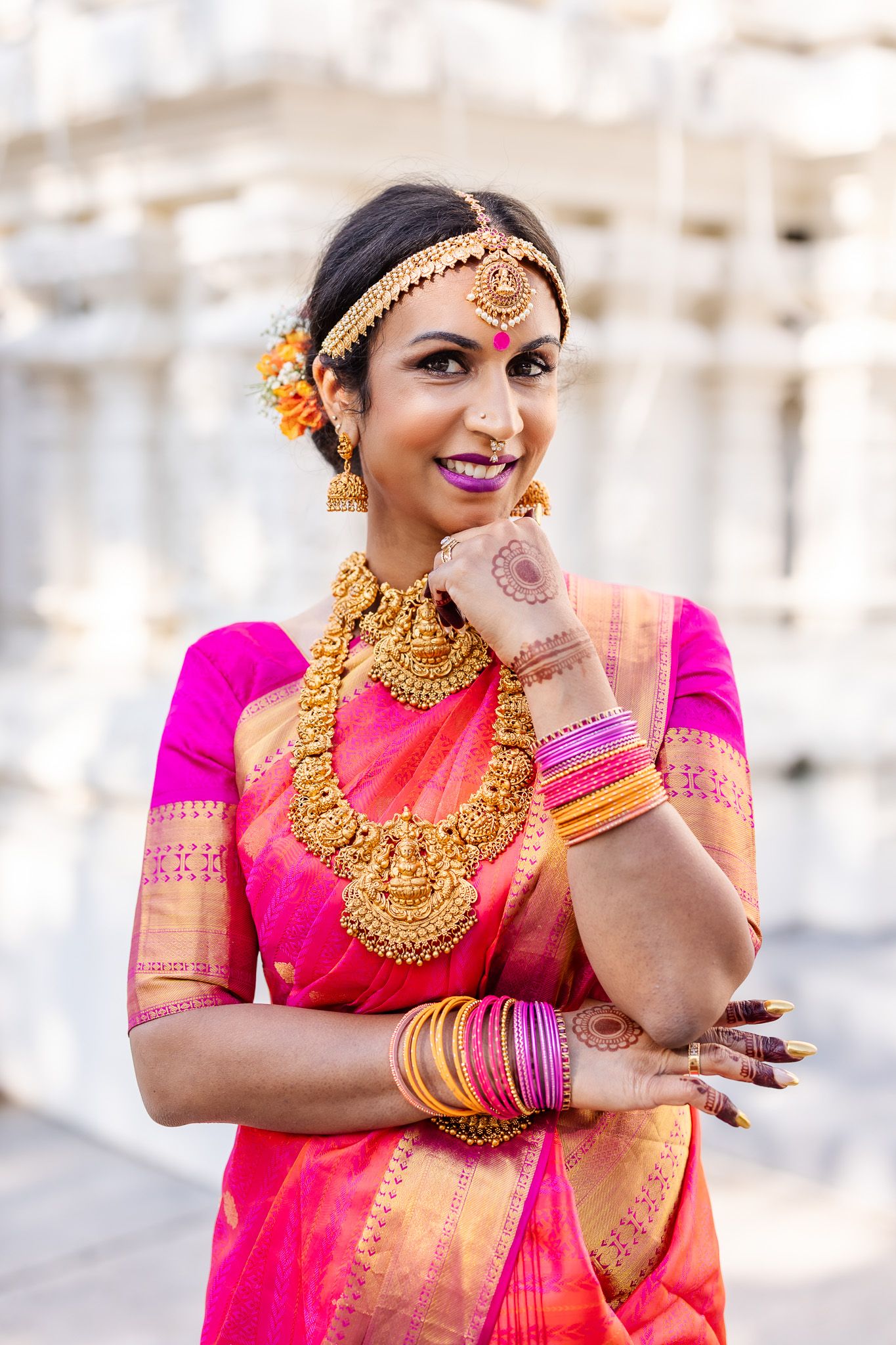 Traditional Indian bride wearing vibrant pink saree and ornate gold jewelry poses elegantly in four different shots.
