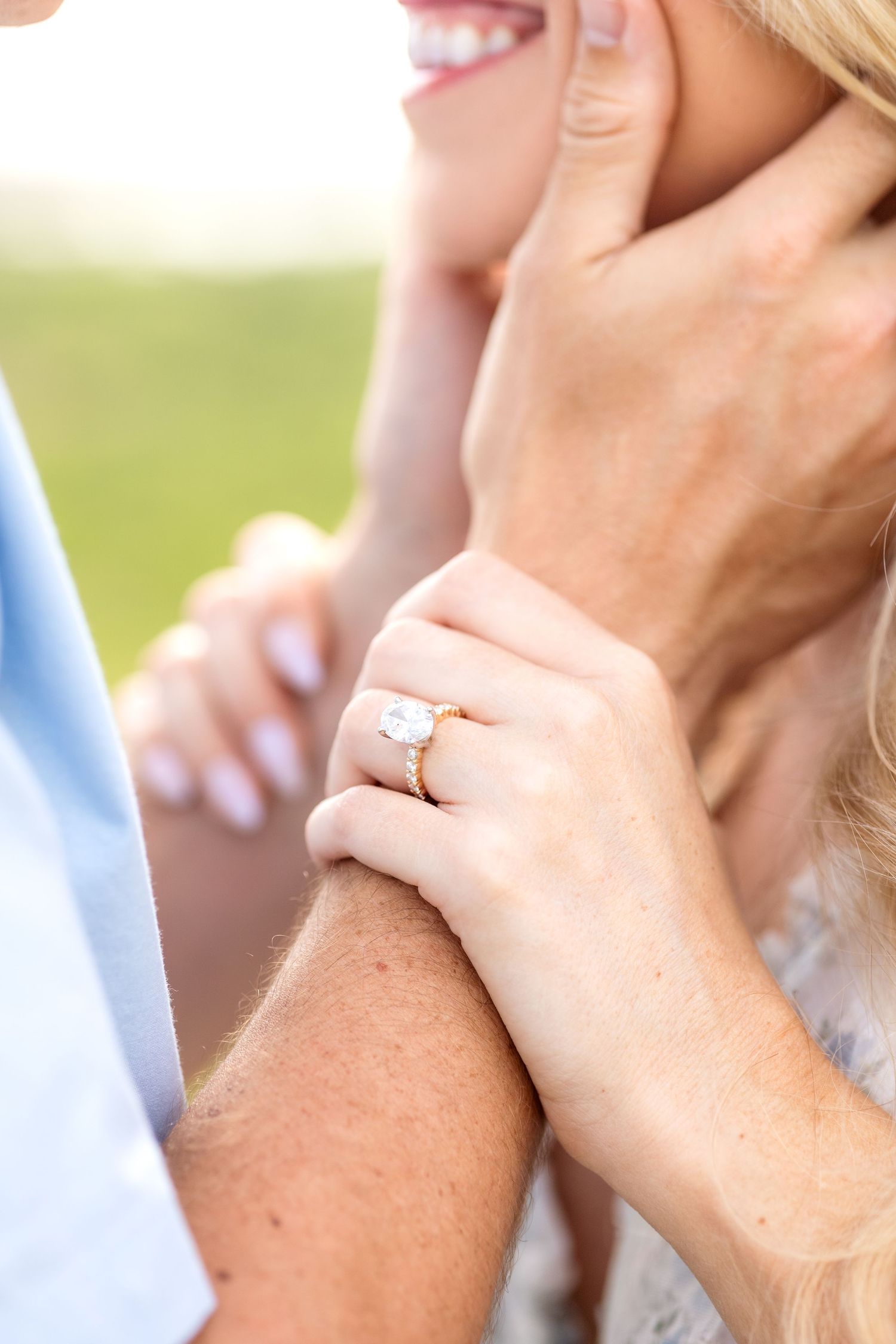 Close up image of a woman's engagement ring during Texas engagement photo session with Jayme Jones Photography