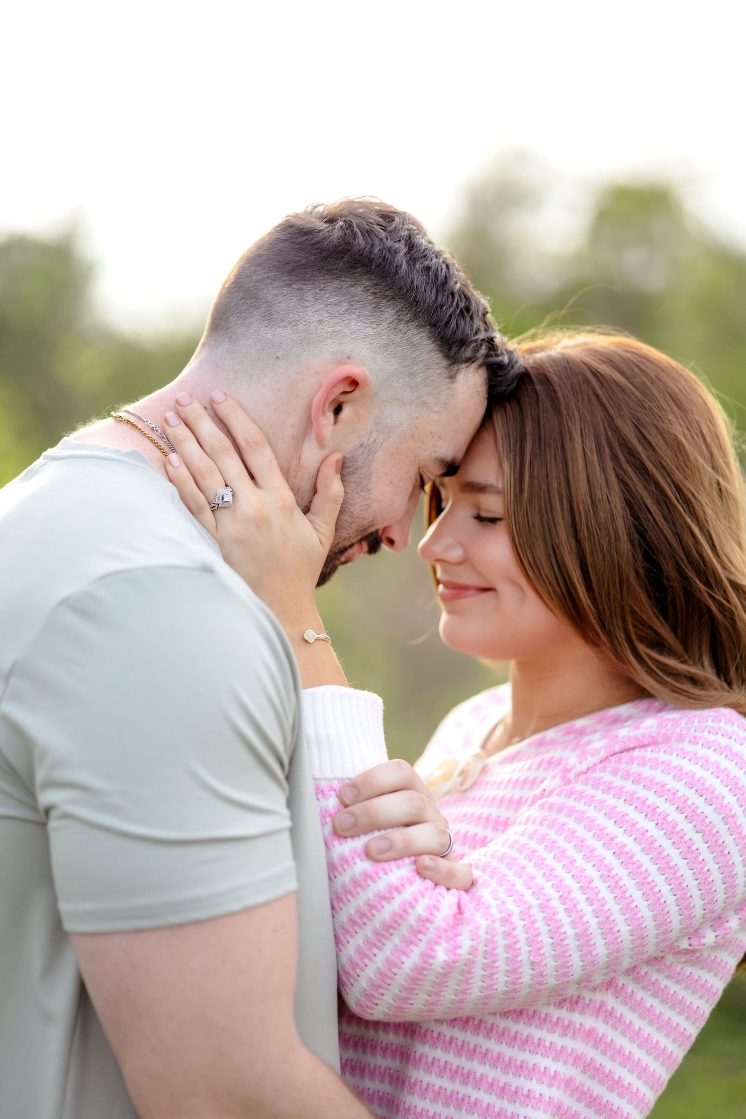 Married couple resting their foreheads together and closing their eyes at a romantic couples photo session