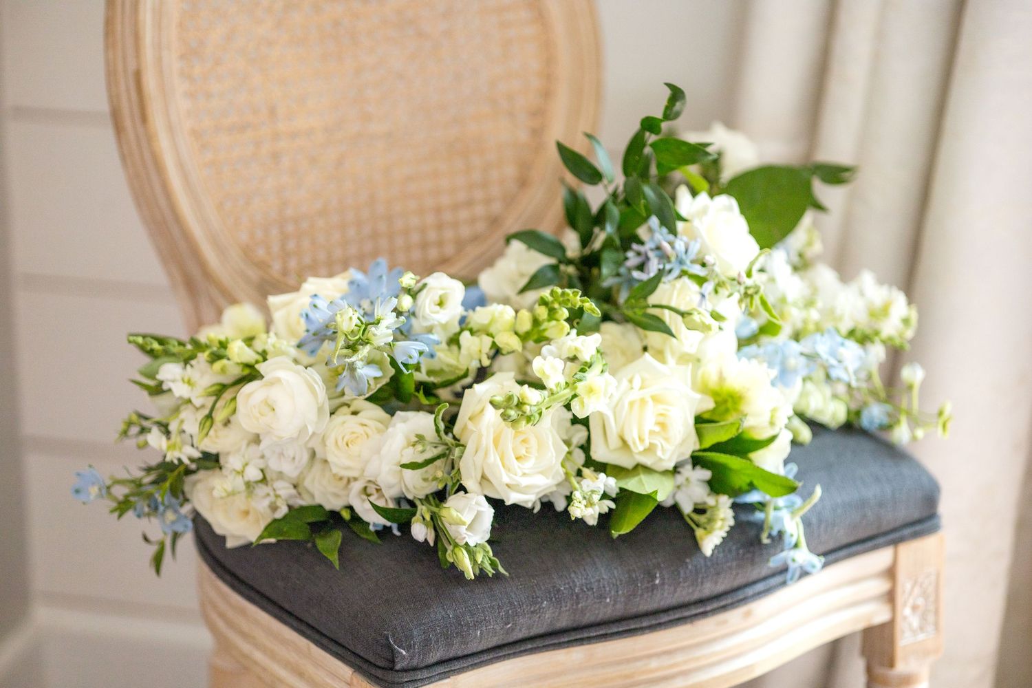 Dallas Spring bridal bouquet resting on a chair in the bridal suite