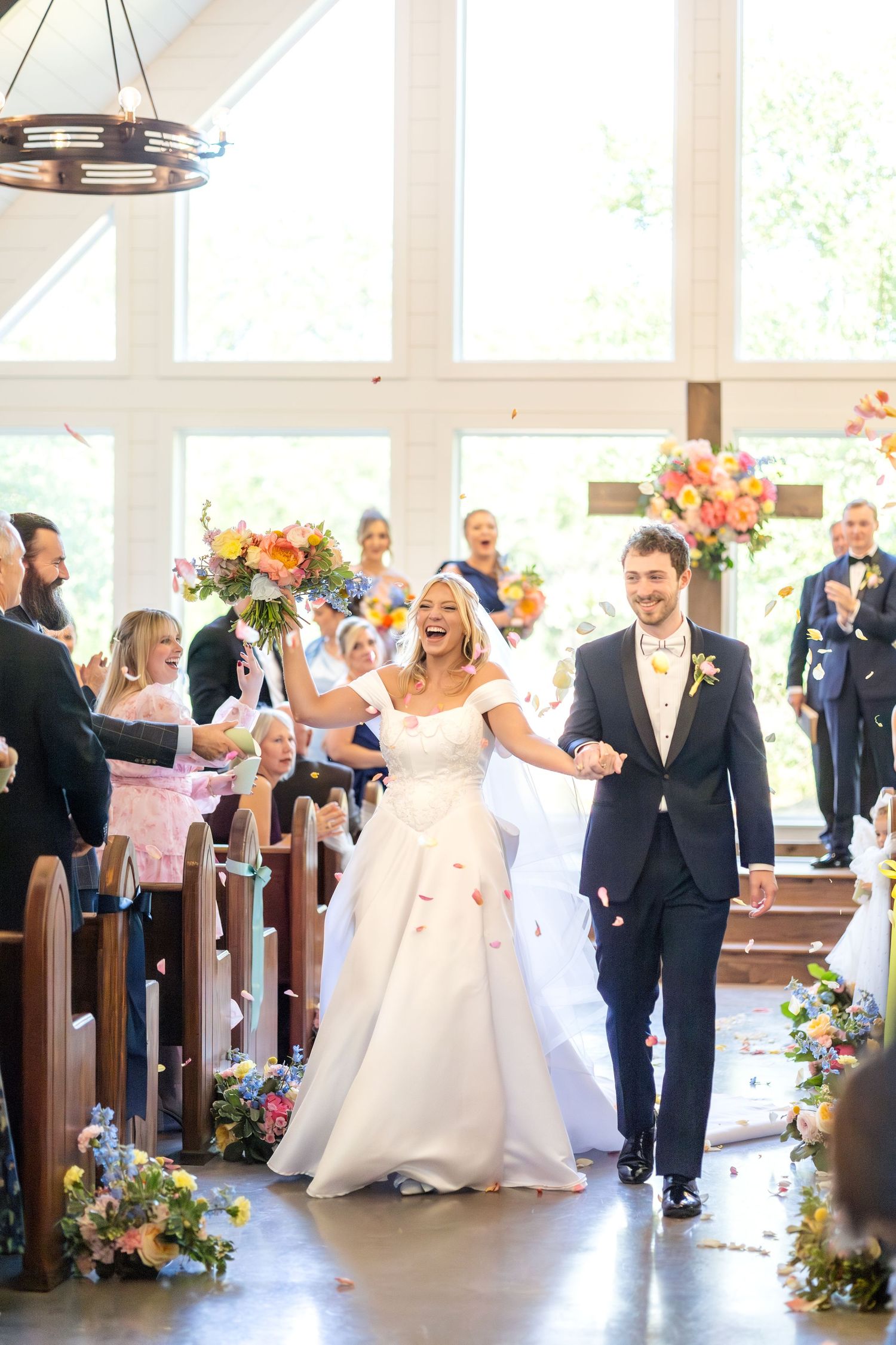 Bride and groom walking back down the aisle at wedding ceremony in Dallas, Texas
