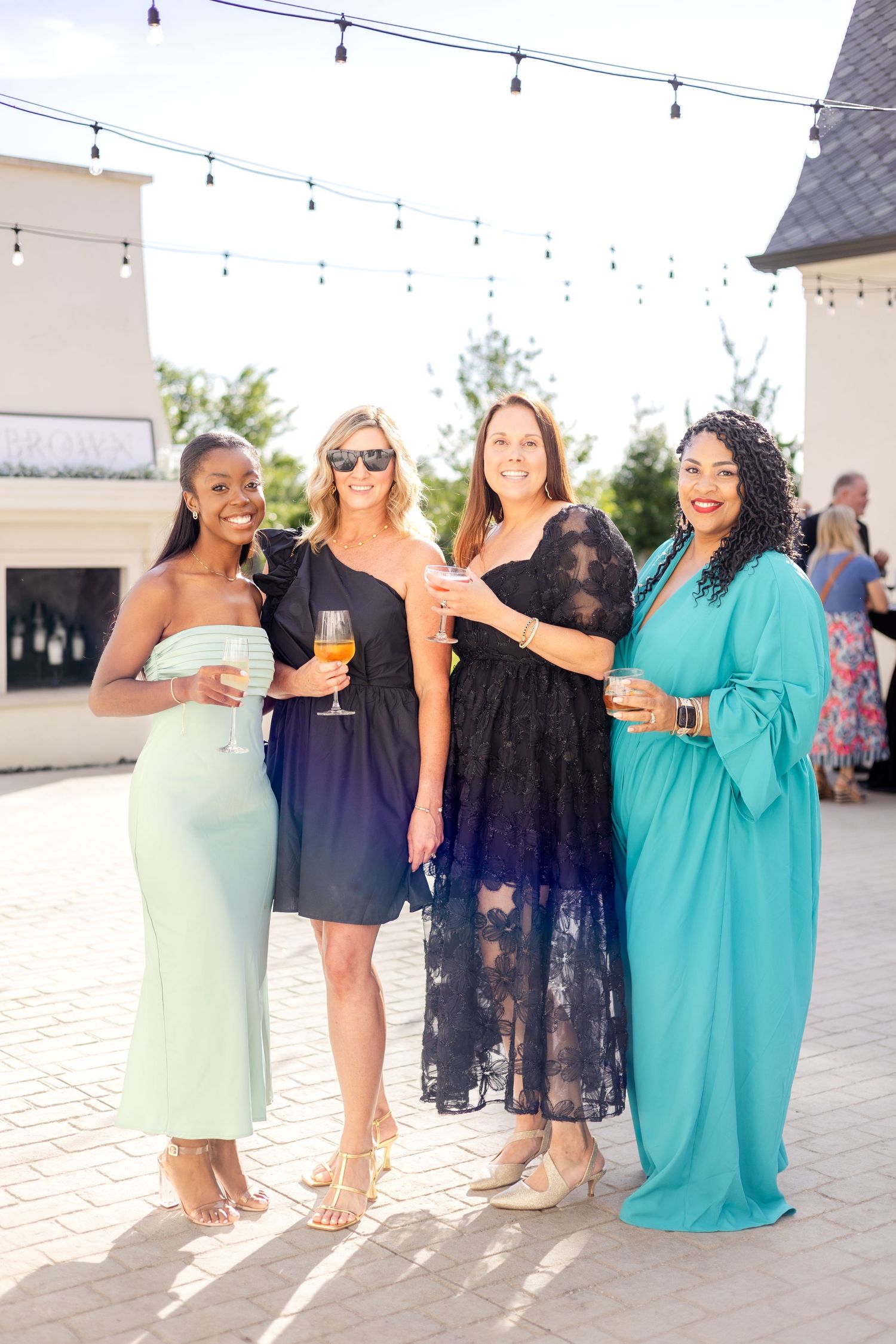 Dallas summer wedding guests enjoying cocktail hour during luxury wedding day