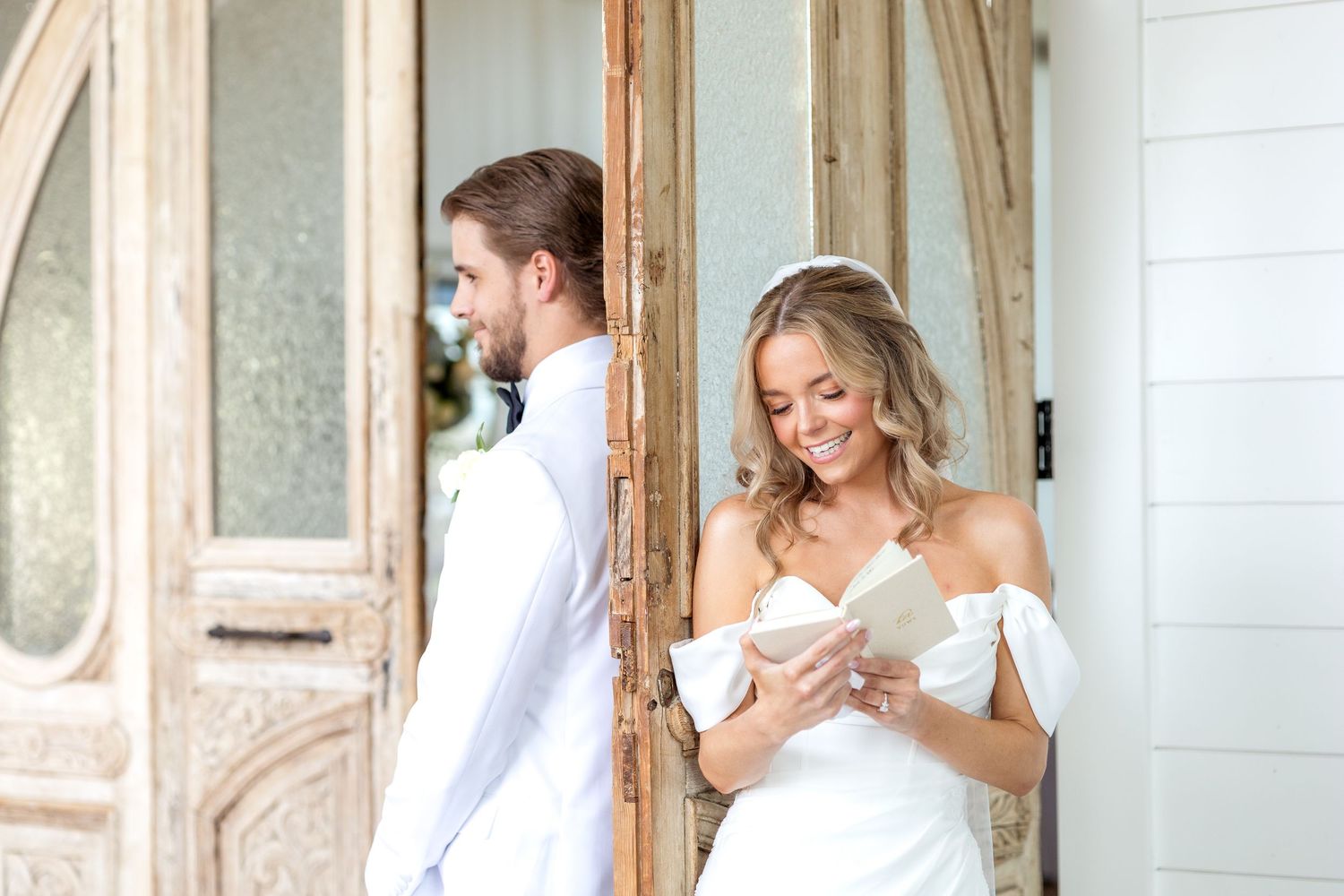Bride and groom sharing private wedding vows back to back at Dallas wedding venue in Spring