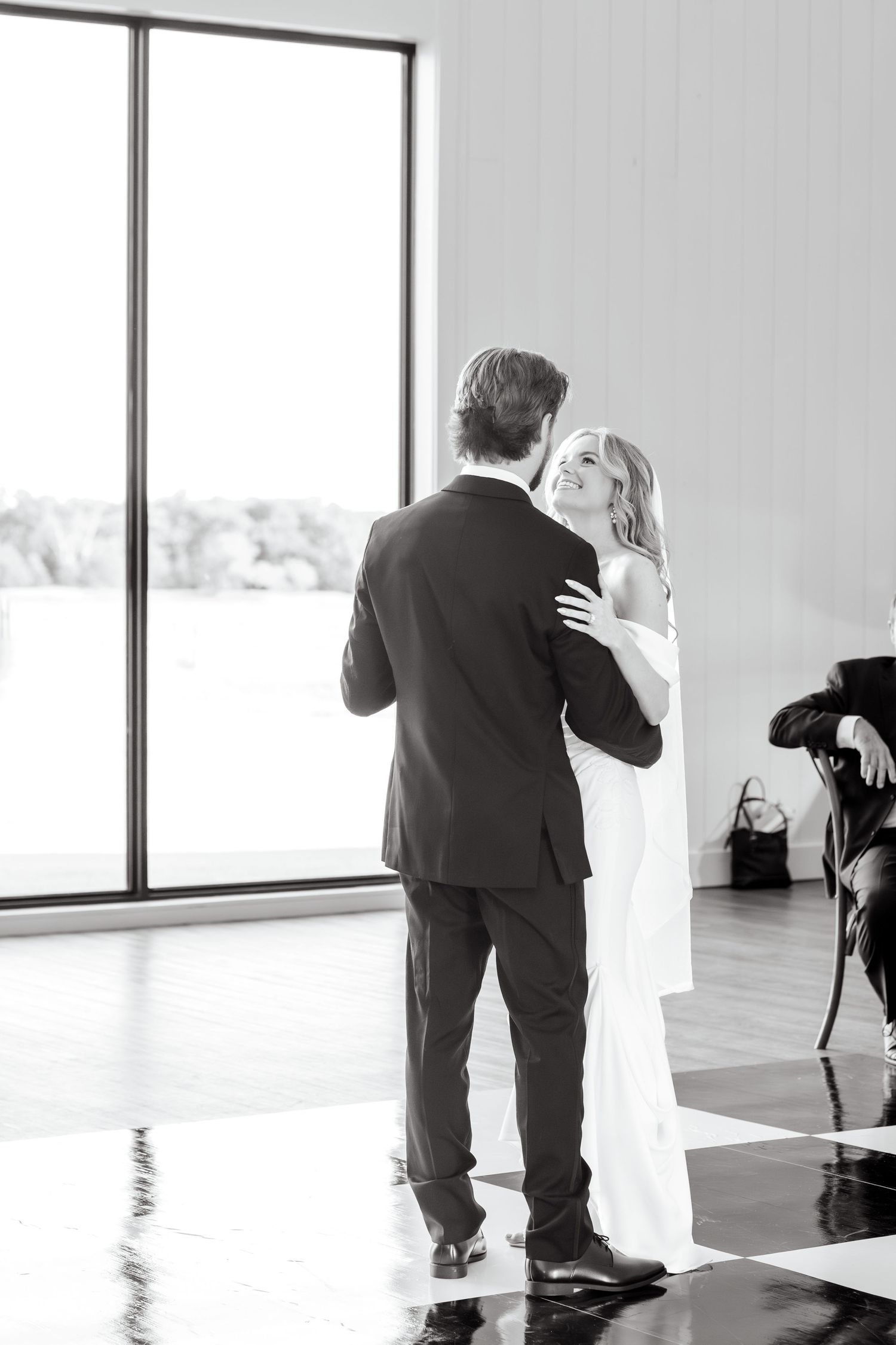 Bride and groom first dance at Chandelier Farms during Dallas Spring wedding day
