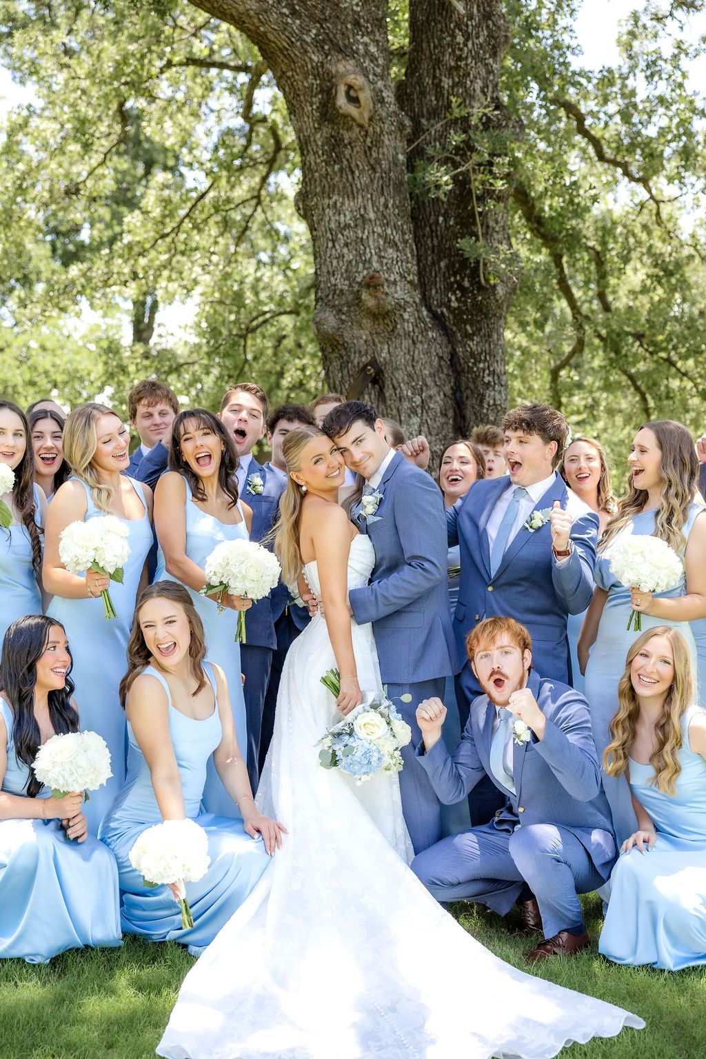 Bride and groom with wedding party with a light blue color scheme wedding in Dallas, Texas