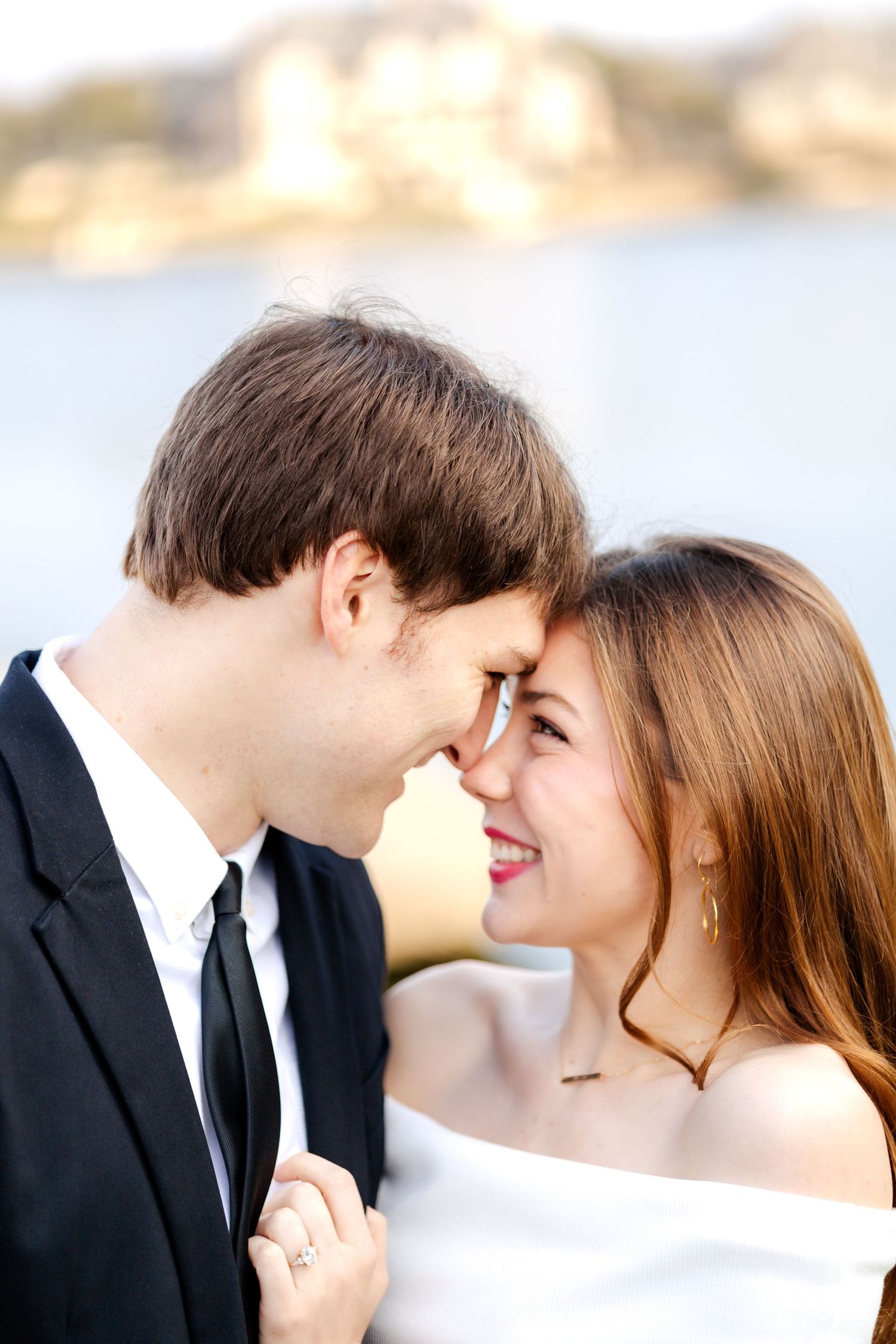 engaged couple looking intently and romantically into each other's eyes in Dallas