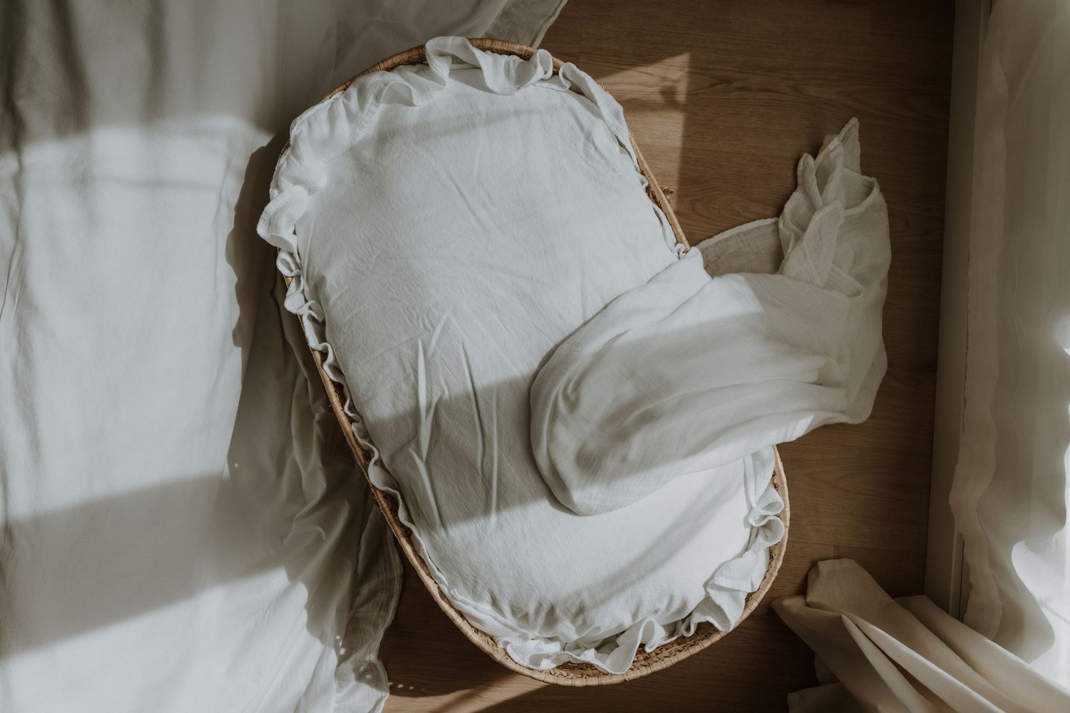 Cozy Edmonton studio setup, perfect example of a relaxing newborn photography session with soft lighting.