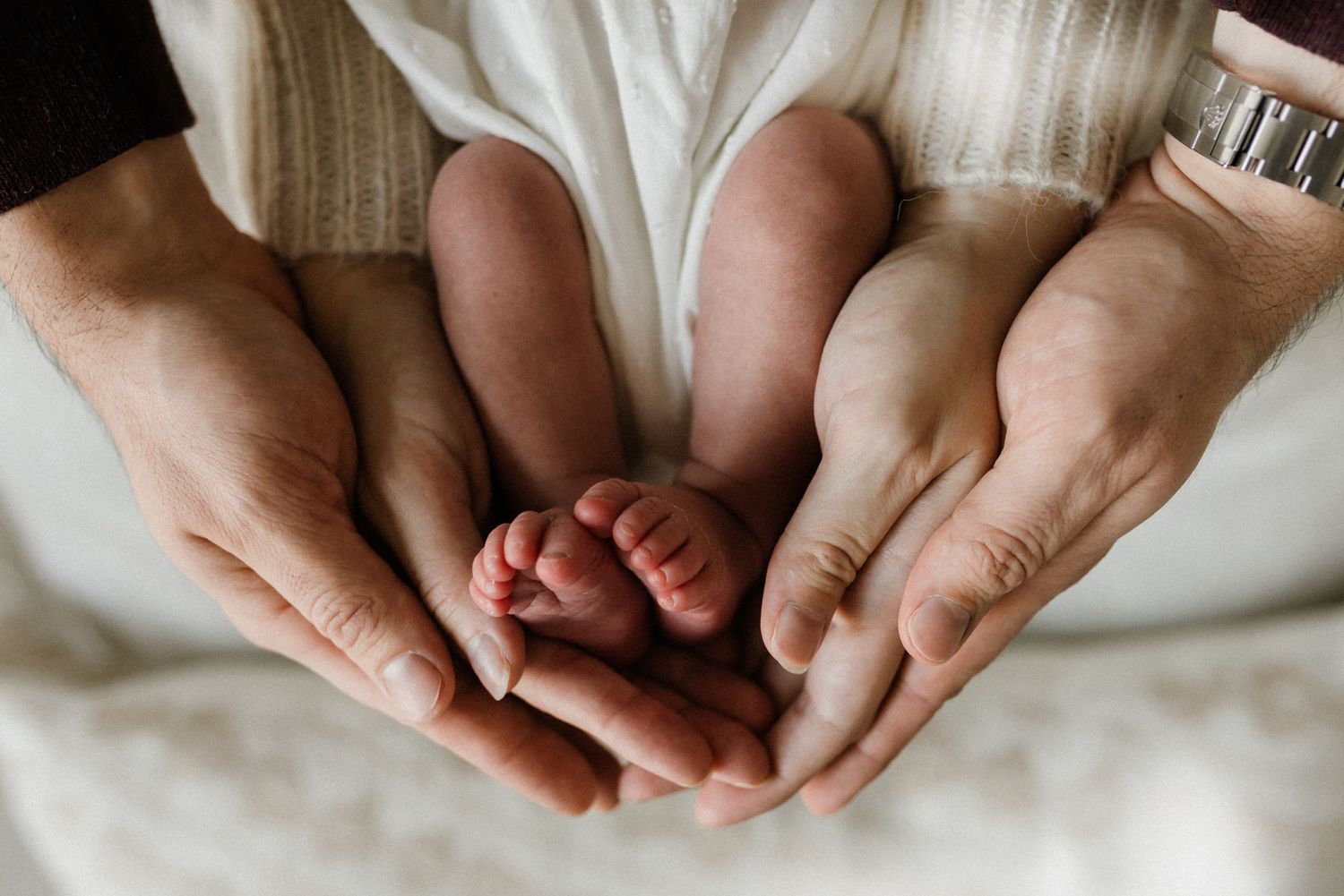 Studio newborn photography session in Edmonton, Alberta, capturing tiny details and family memories.