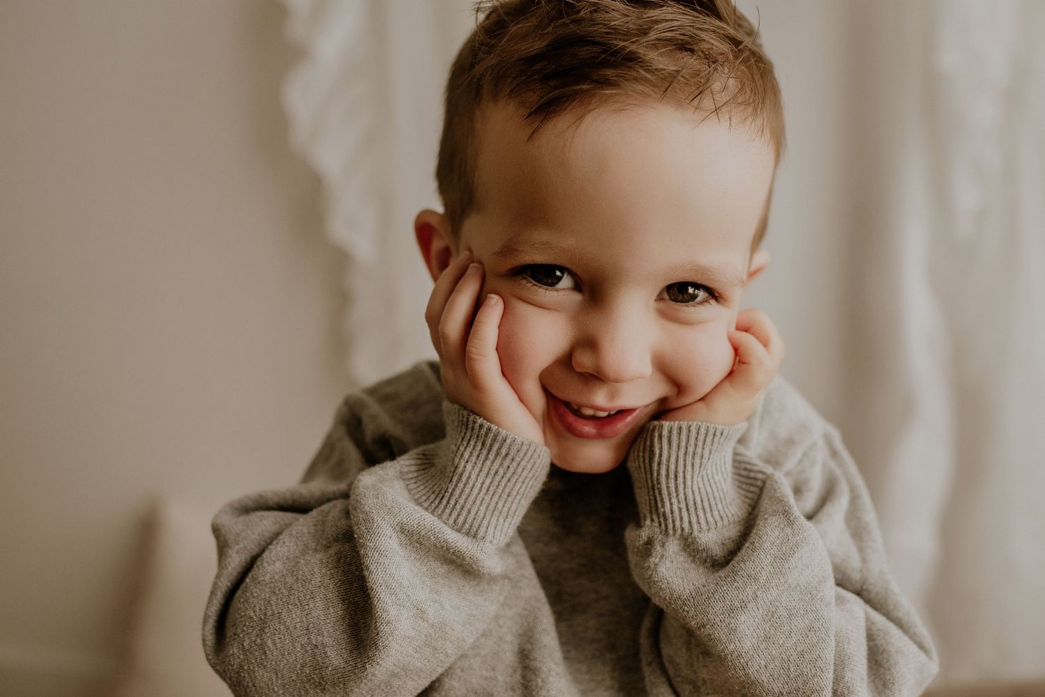 Studio family photography in Edmonton, Alberta, emphasizing warmth, love, and togetherness in portraits.