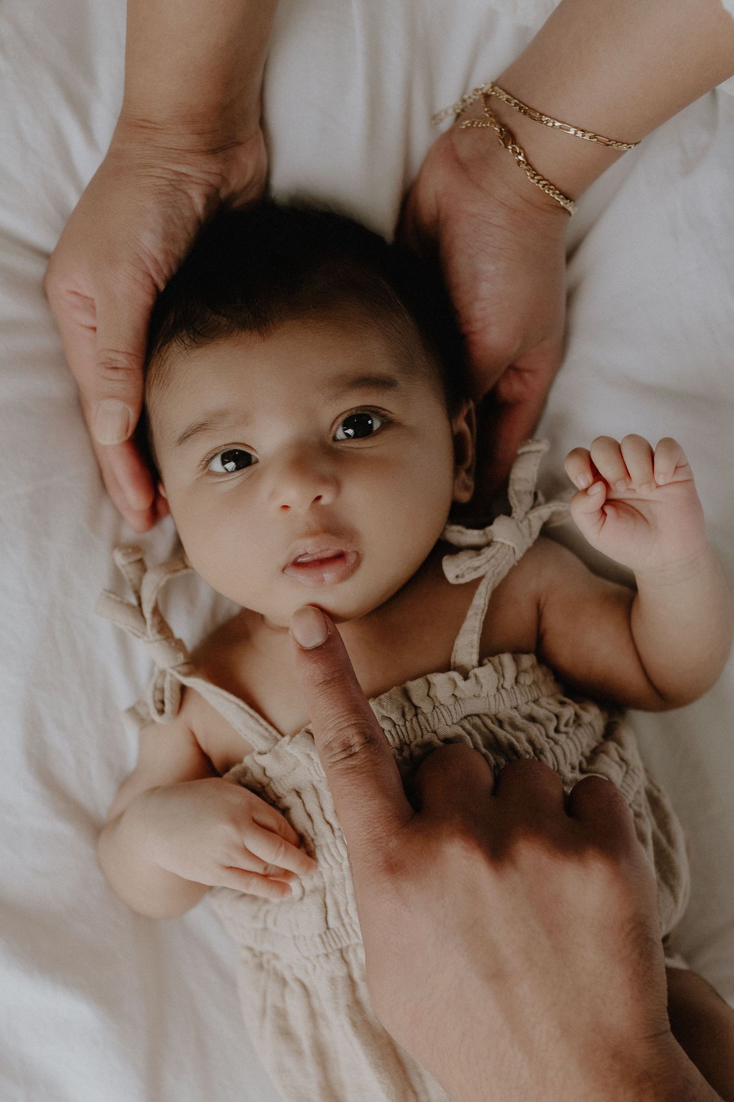 Studio newborn photography session in Edmonton, Alberta, capturing tiny details and family memories.