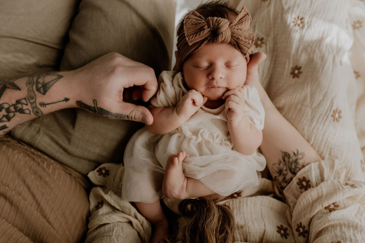 Close-up of newborn hands and feet in Edmonton studio, showcasing professional newborn photography style.