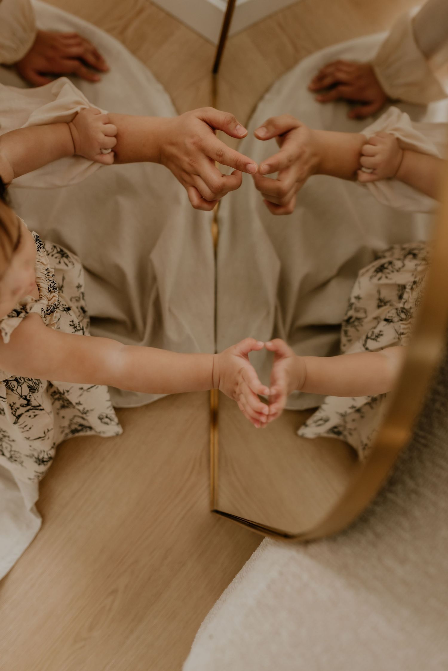Family photography session in Edmonton, Alberta, capturing children enjoying light-filled portraits.
