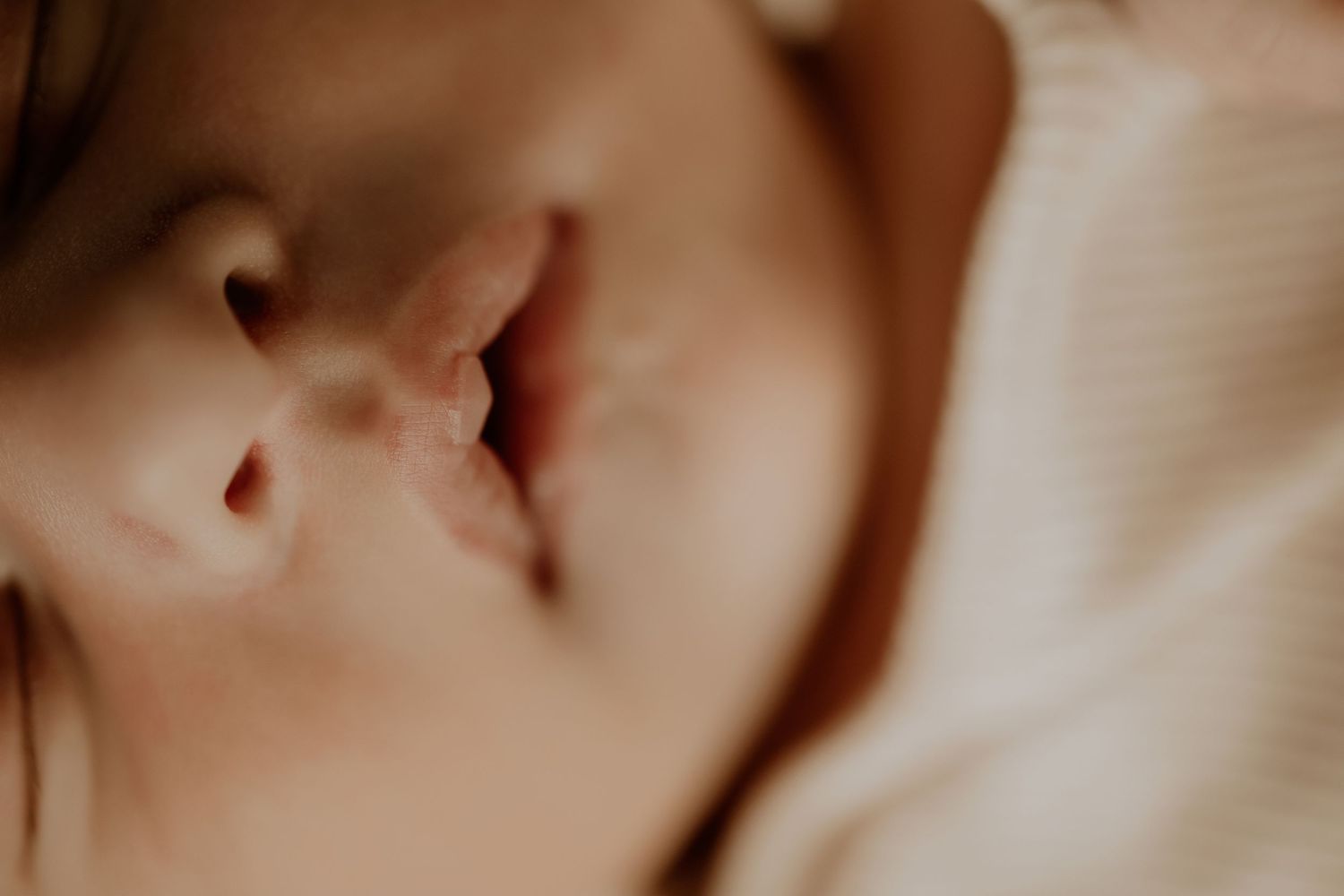 Close-up of newborn in Edmonton studio, showcasing professional newborn photography style.