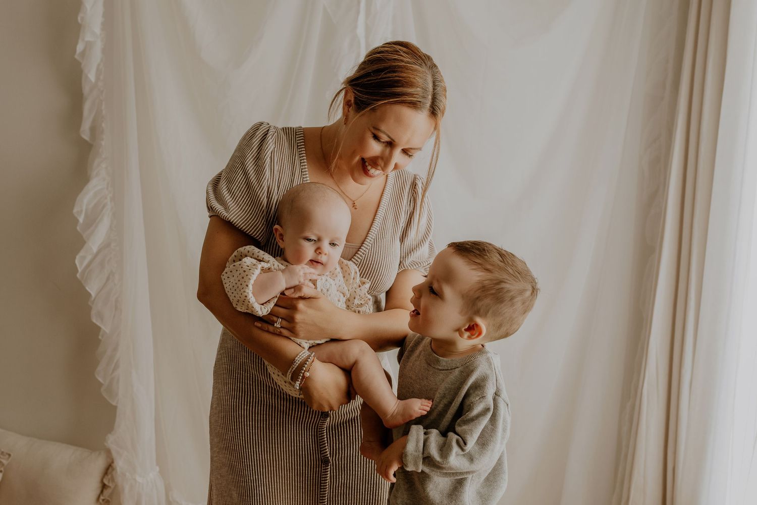 Studio newborn photography session in Edmonton, Alberta, capturing tiny details and family memories.
