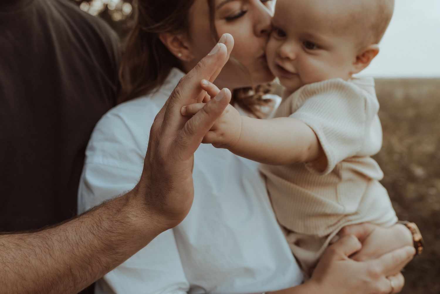 Outdoor newborn photography session in Edmonton, Alberta, capturing tiny details and family memories.