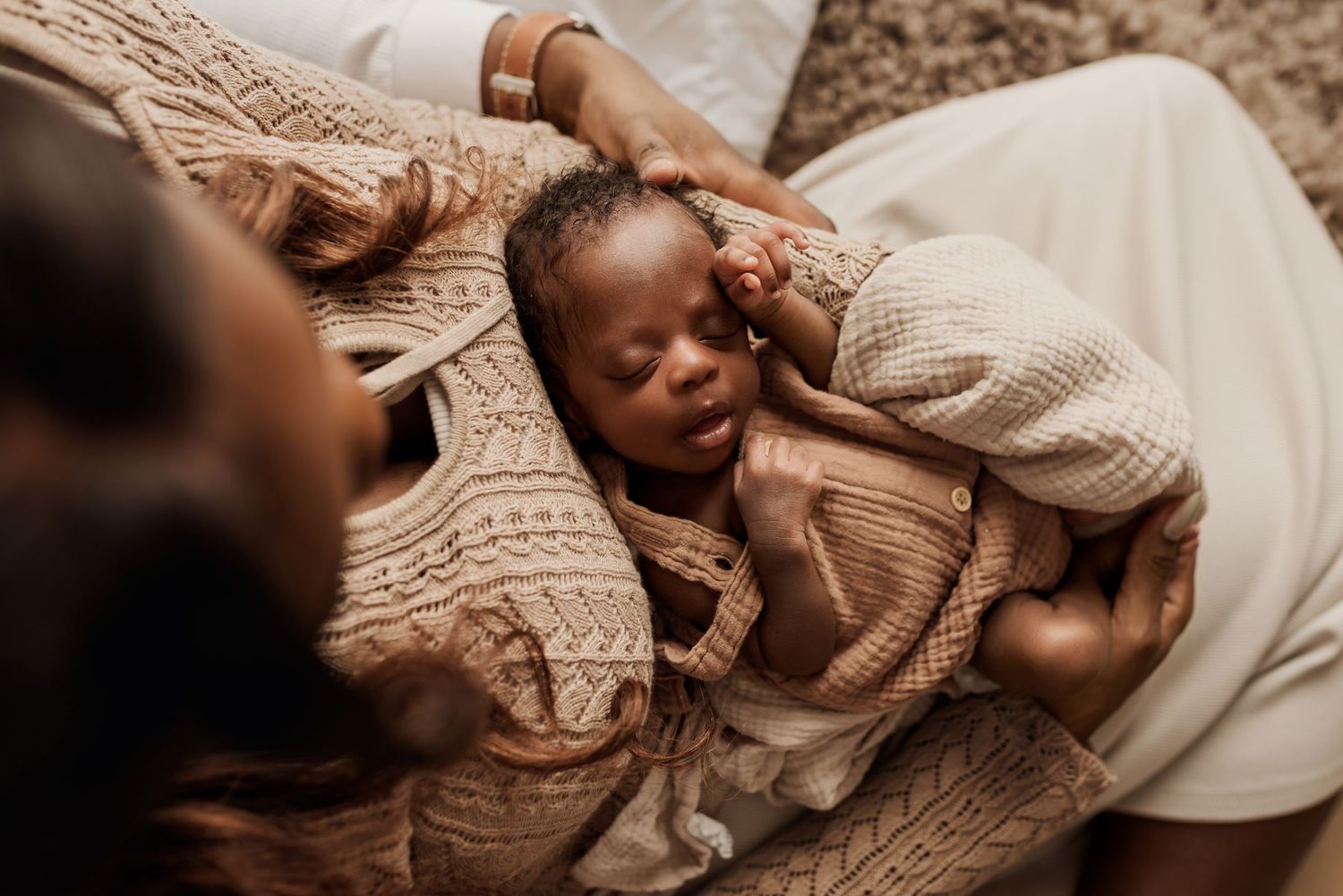 Sleeping newborn in studio photography session in Edmonton, Alberta, capturing peaceful early life moments.