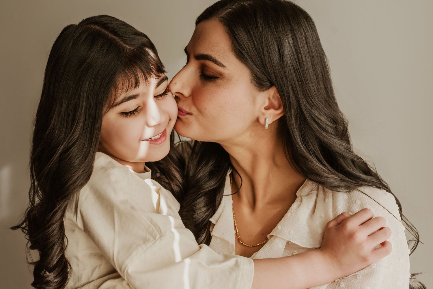 Studio family photography in Edmonton, Alberta, emphasizing warmth, love, and togetherness in portraits.