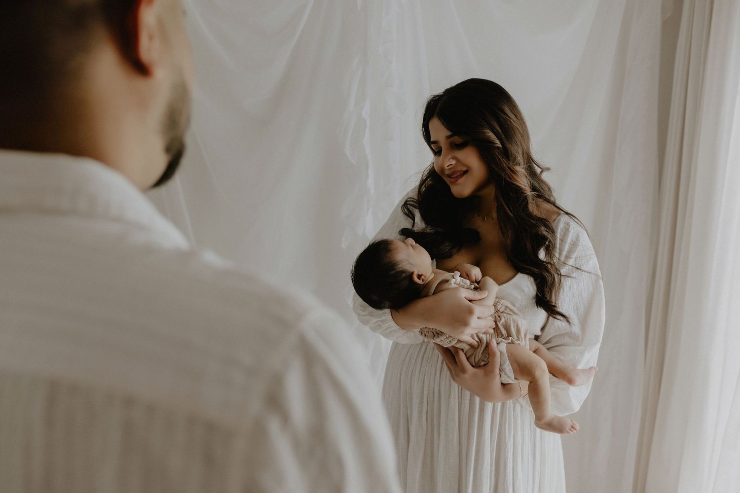 Studio newborn photography session in Edmonton, Alberta, capturing tiny details and family memories.