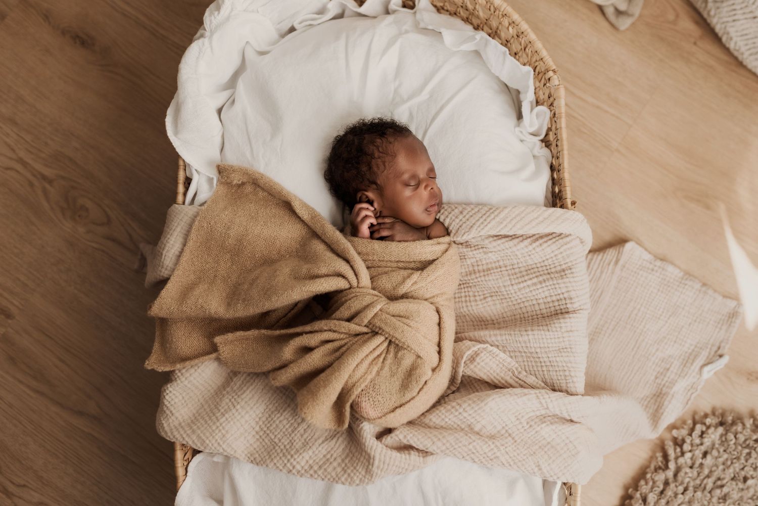 Sleeping newborn in studio photography session in Edmonton, Alberta, capturing peaceful early life moments.