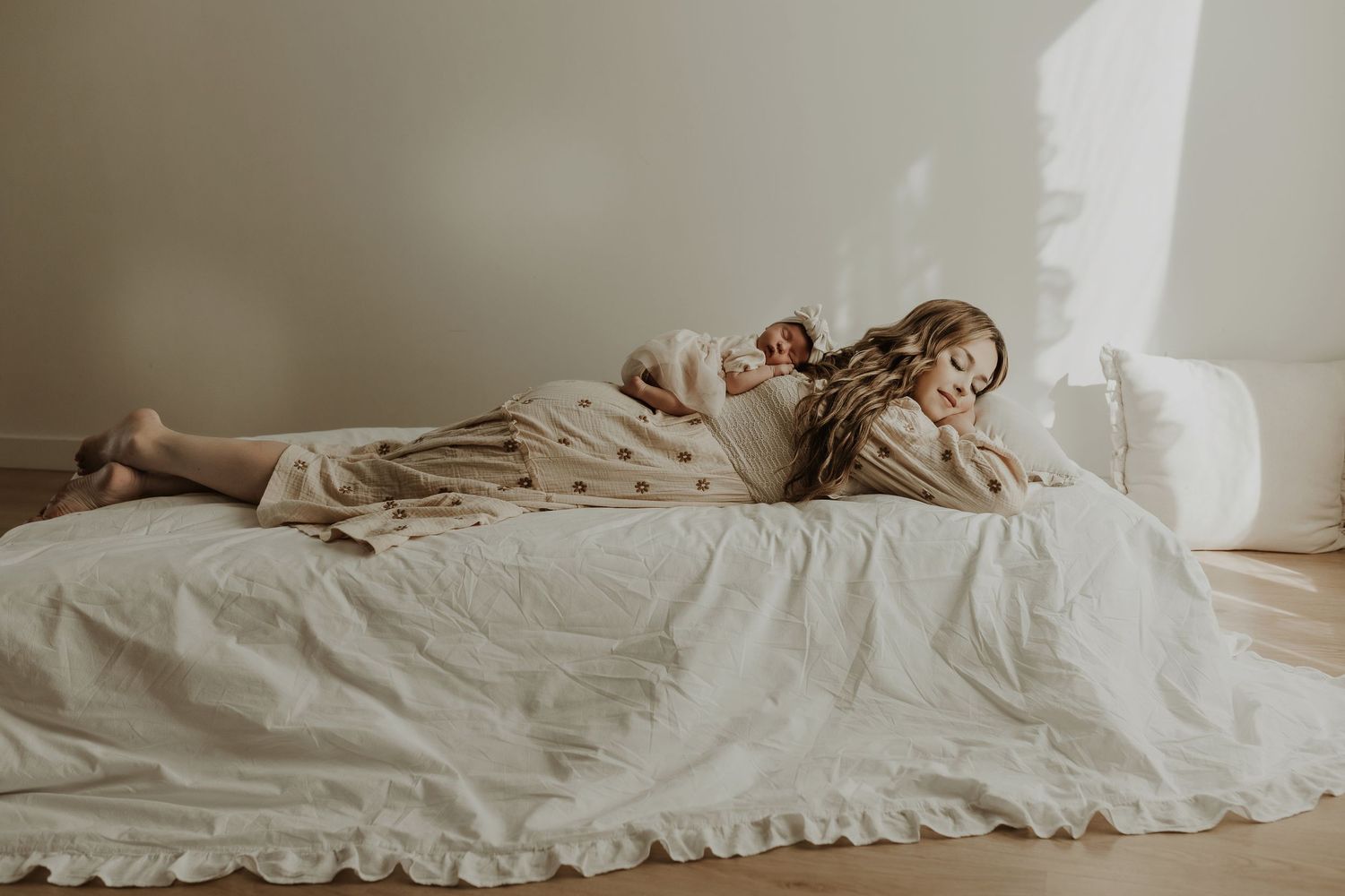 Sleeping newborn in studio photography session in Edmonton, Alberta, capturing peaceful early life moments.