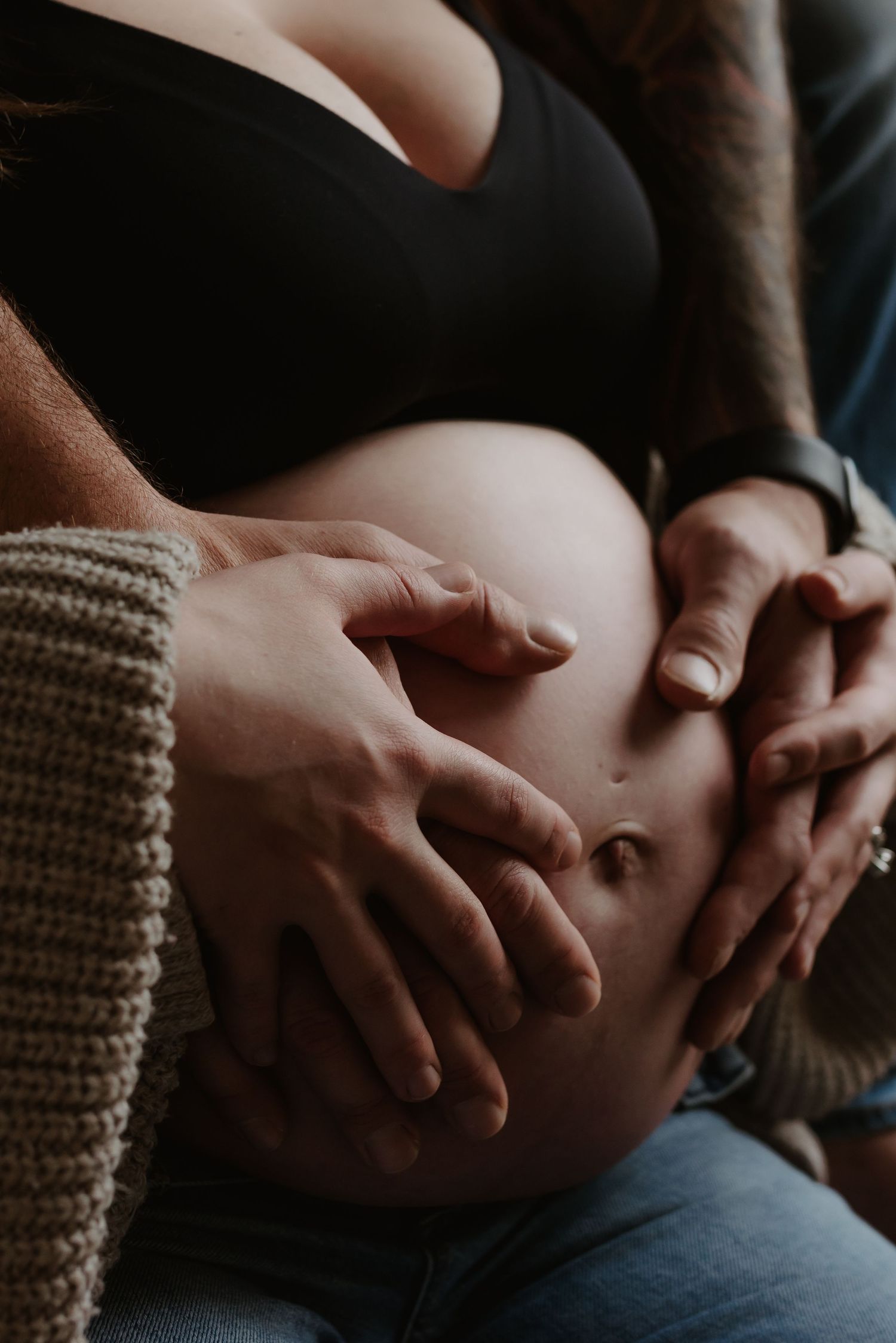 Studio maternity portrait of expecting mother in Edmonton, Alberta, showcasing elegant and timeless pregnancy photos.