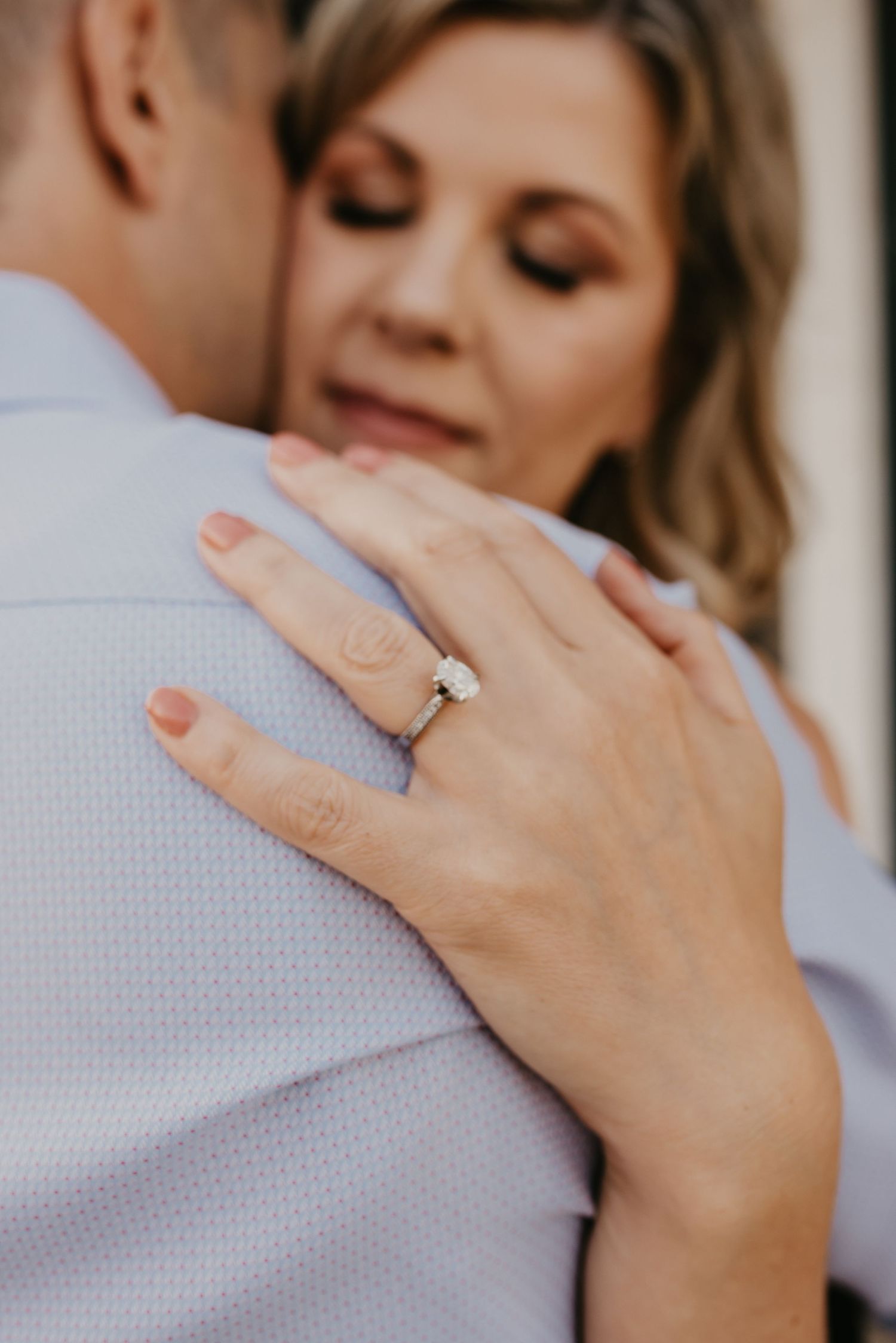 Professional Edmonton family photography capturing couple in joyful, natural light settings.