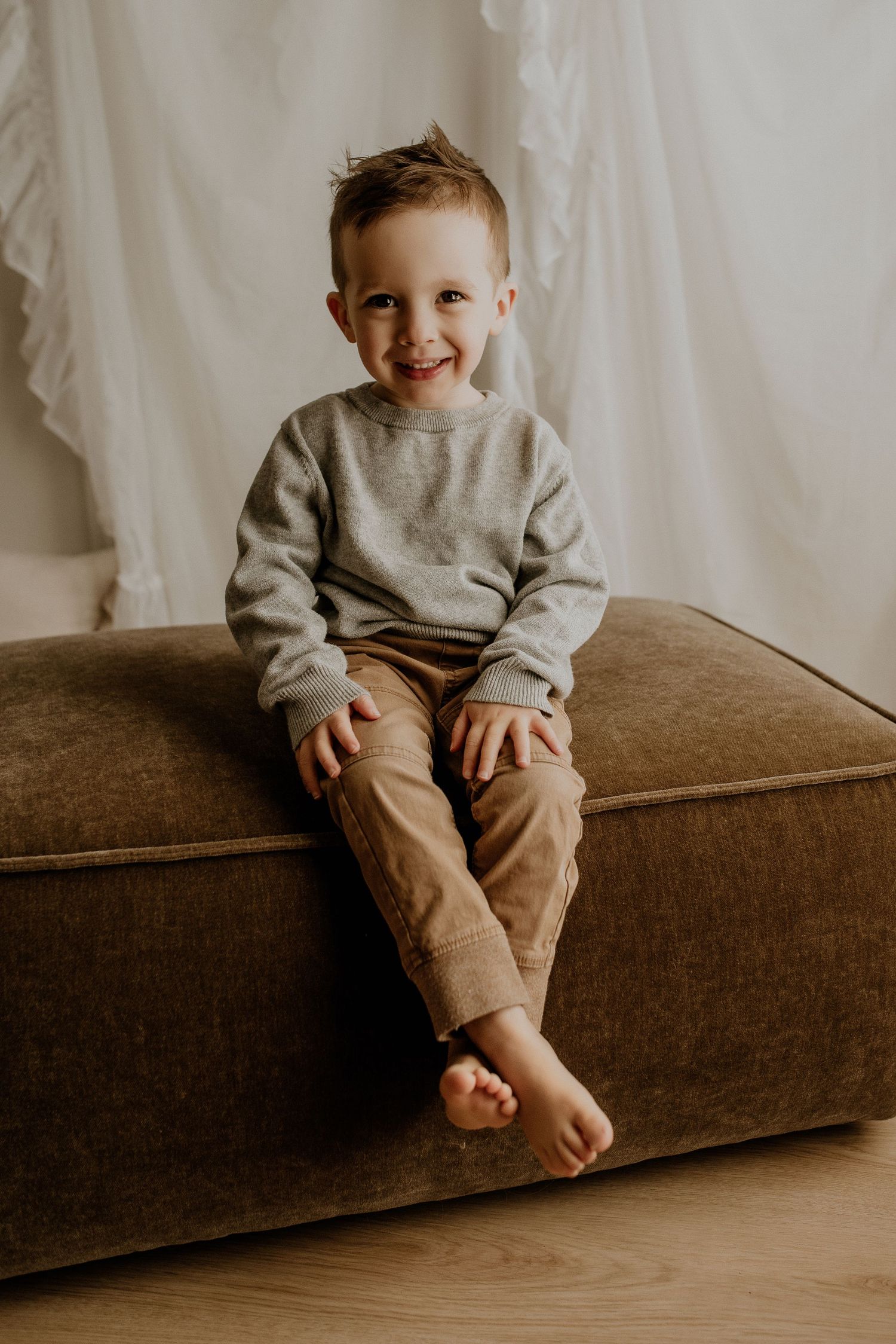Studio family photography in Edmonton, Alberta, emphasizing warmth, love, and togetherness in portraits.