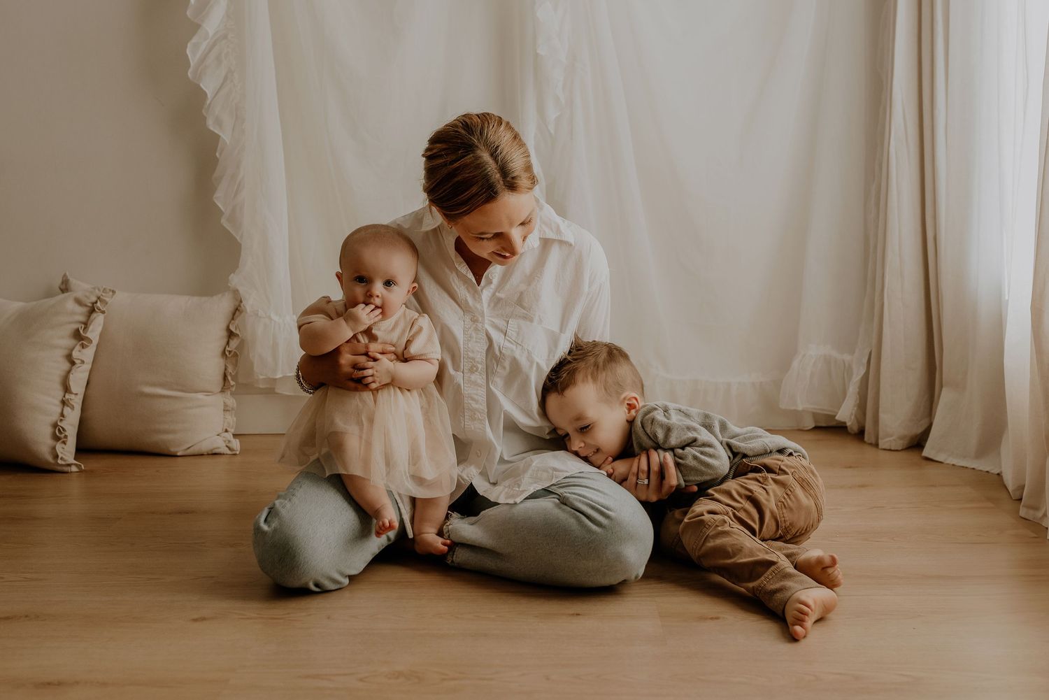 Studio family photography in Edmonton, Alberta, emphasizing warmth, love, and togetherness in portraits.