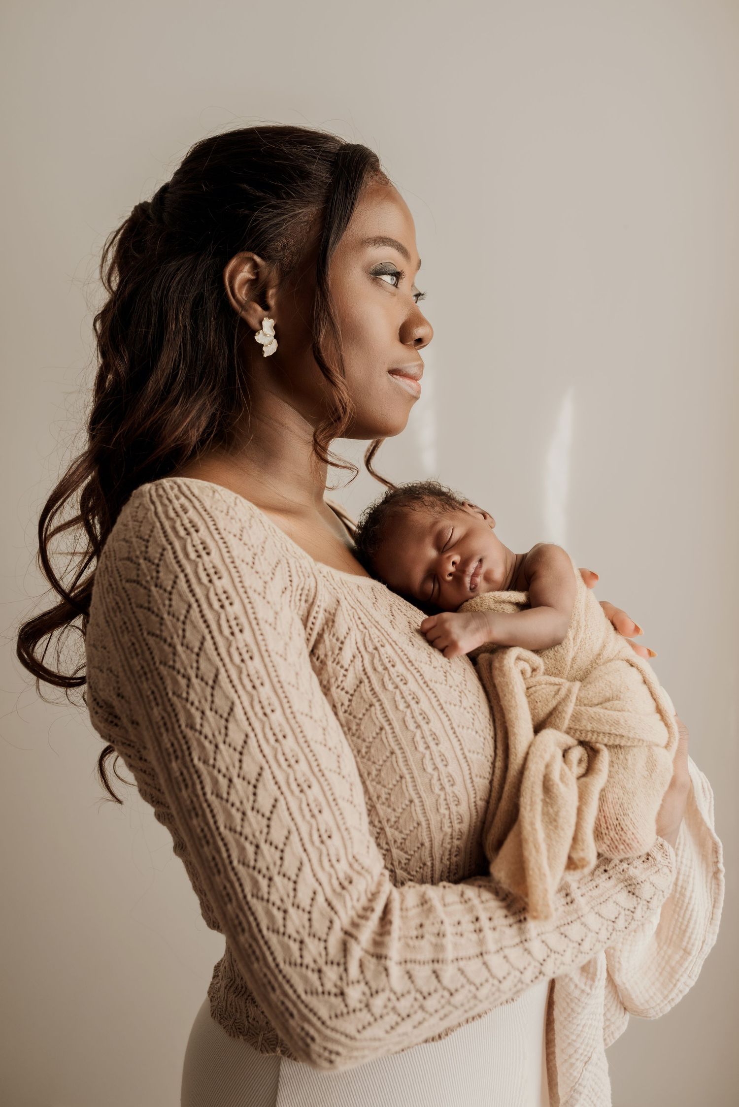 Studio newborn photography session in Edmonton, Alberta, capturing tiny details and family memories.
