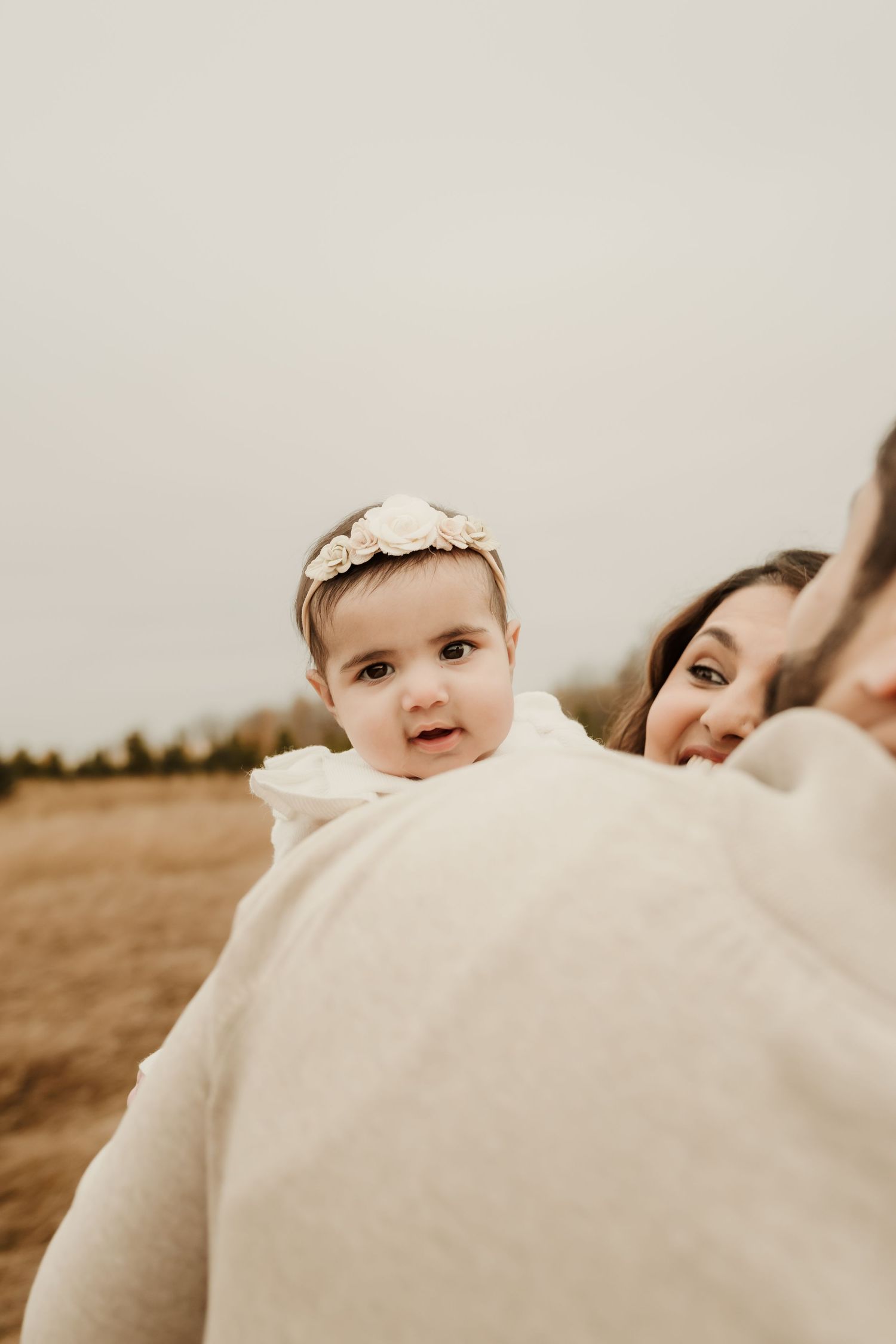 Outdoor newborn photography session in Edmonton, Alberta, capturing tiny details and family memories.