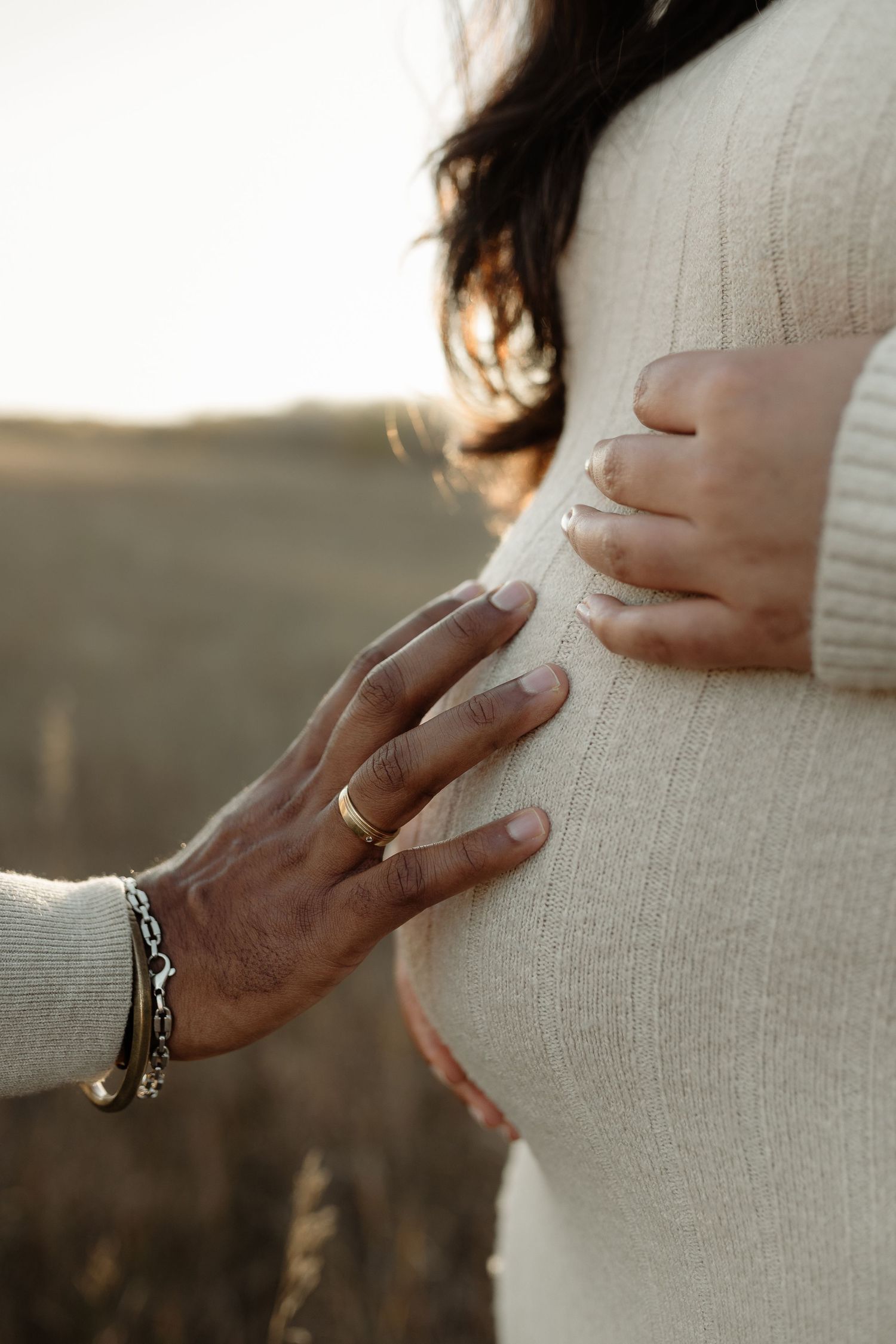 Outdoor maternity portrait of expecting mother in Edmonton, Alberta, showcasing elegant and timeless pregnancy photos.