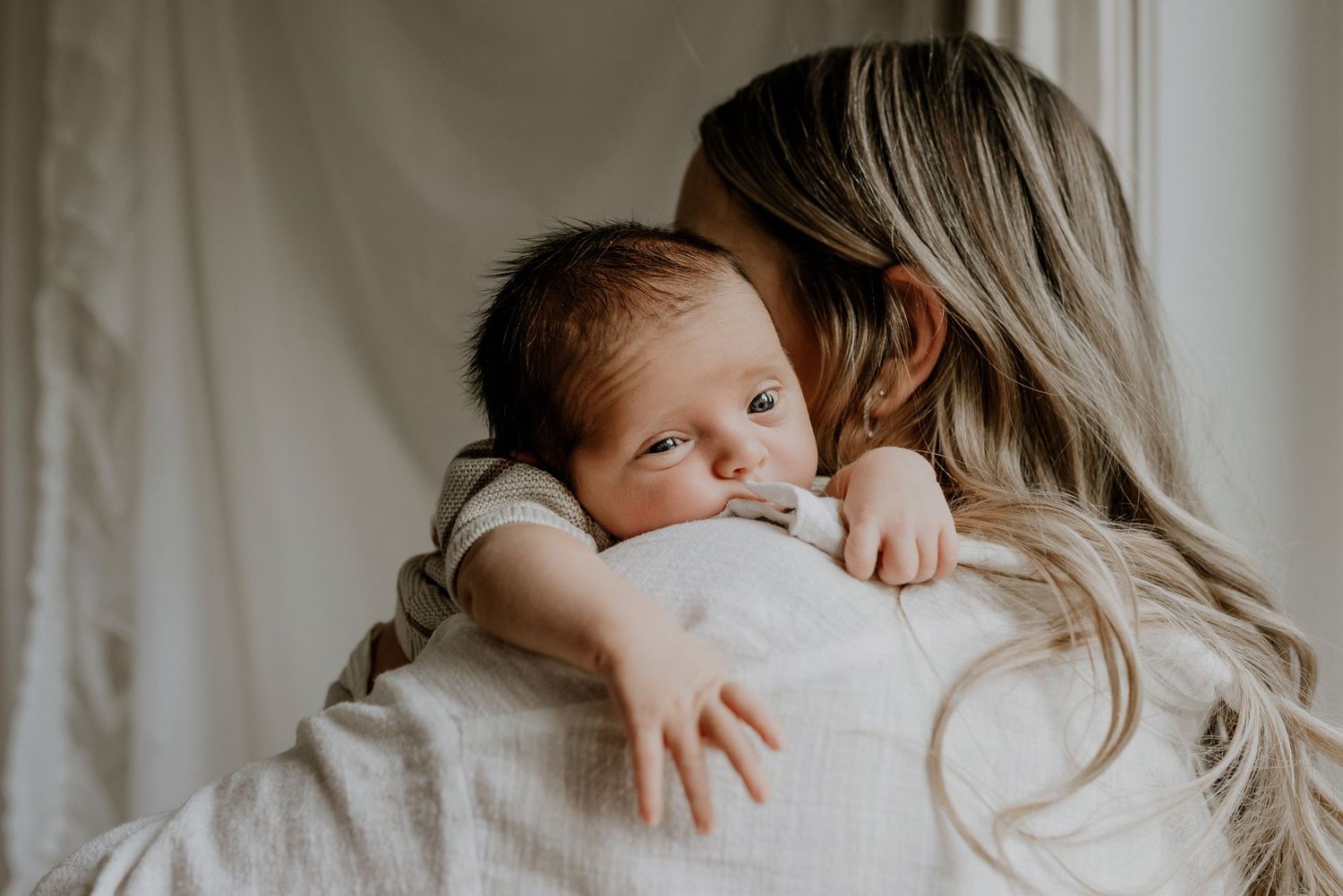 Studio newborn photography session in Edmonton, Alberta, capturing tiny details and family memories.