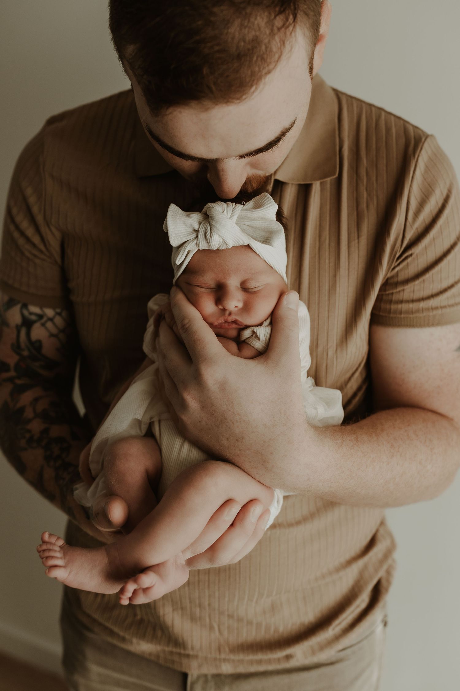 Sleeping newborn in studio photography session in Edmonton, Alberta, capturing peaceful early life moments.