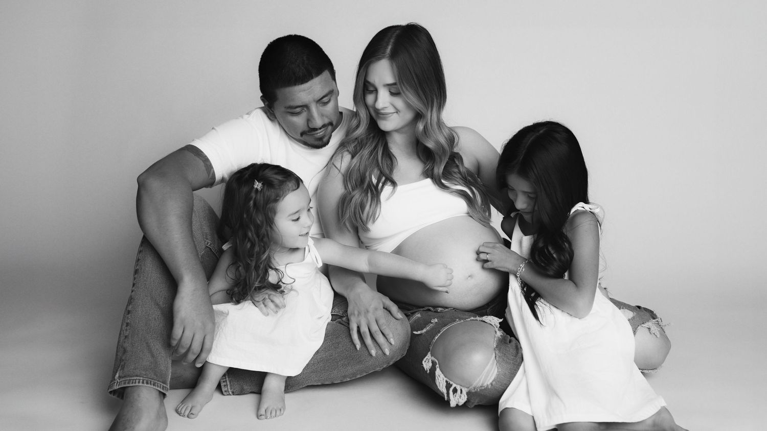 Six black and white photos show tender romantic moments between couples in intimate poses.