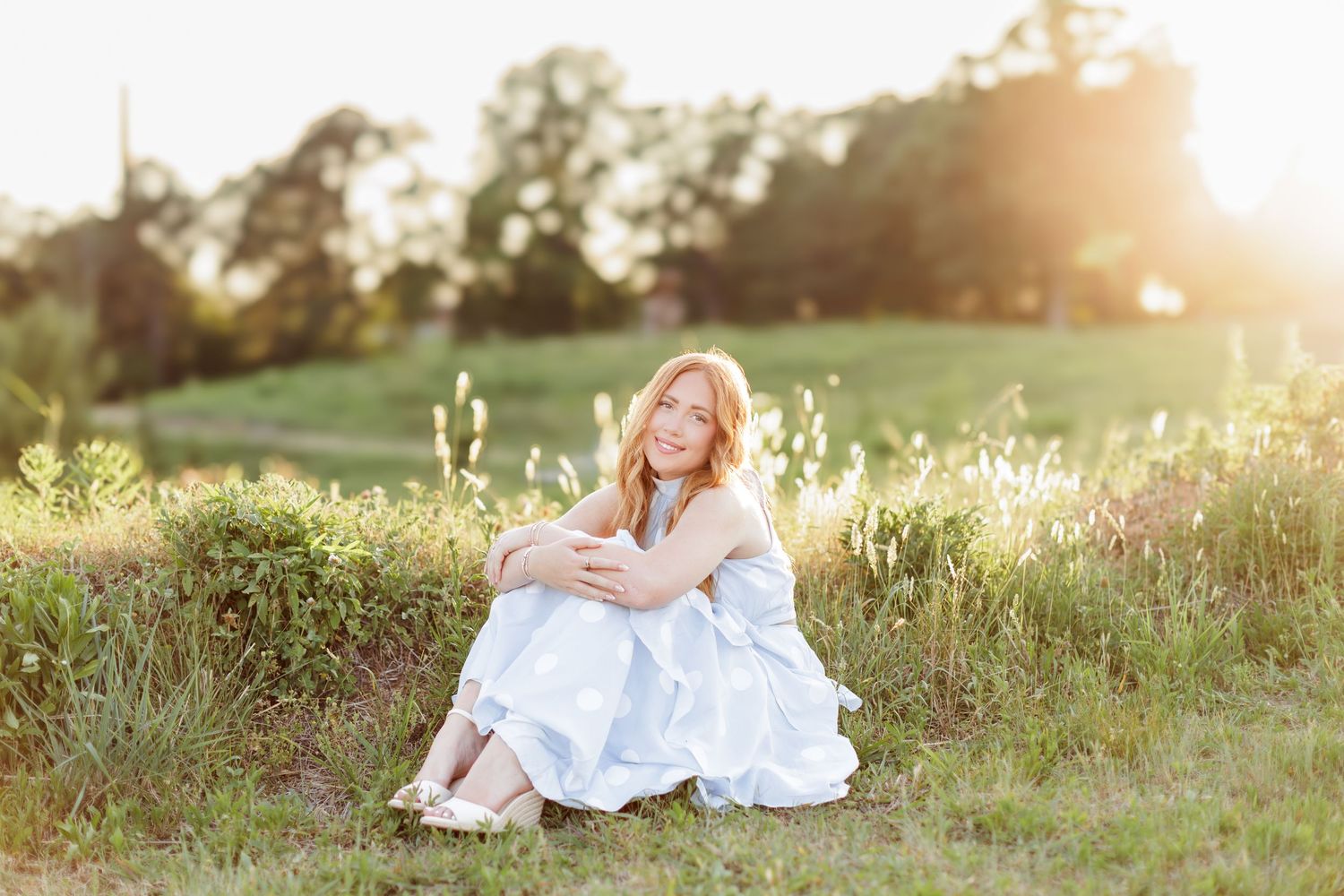 Rolesville High School Senior Session at NCMA in Raleigh NC in field during golden hour.