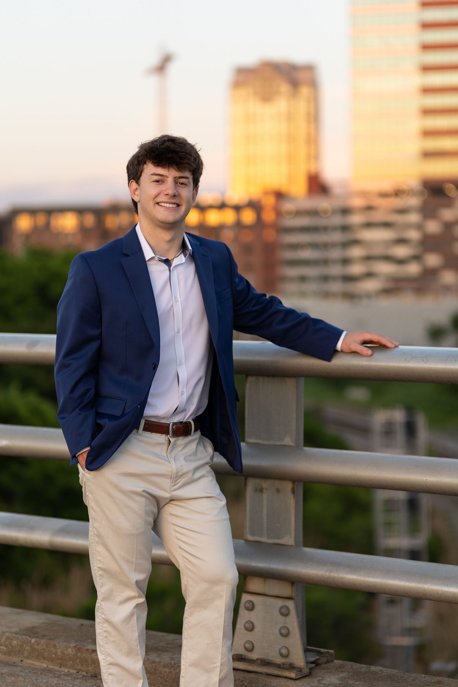 Senior guy, Senior boy photo session in downtown raleigh on boylan bridge.
