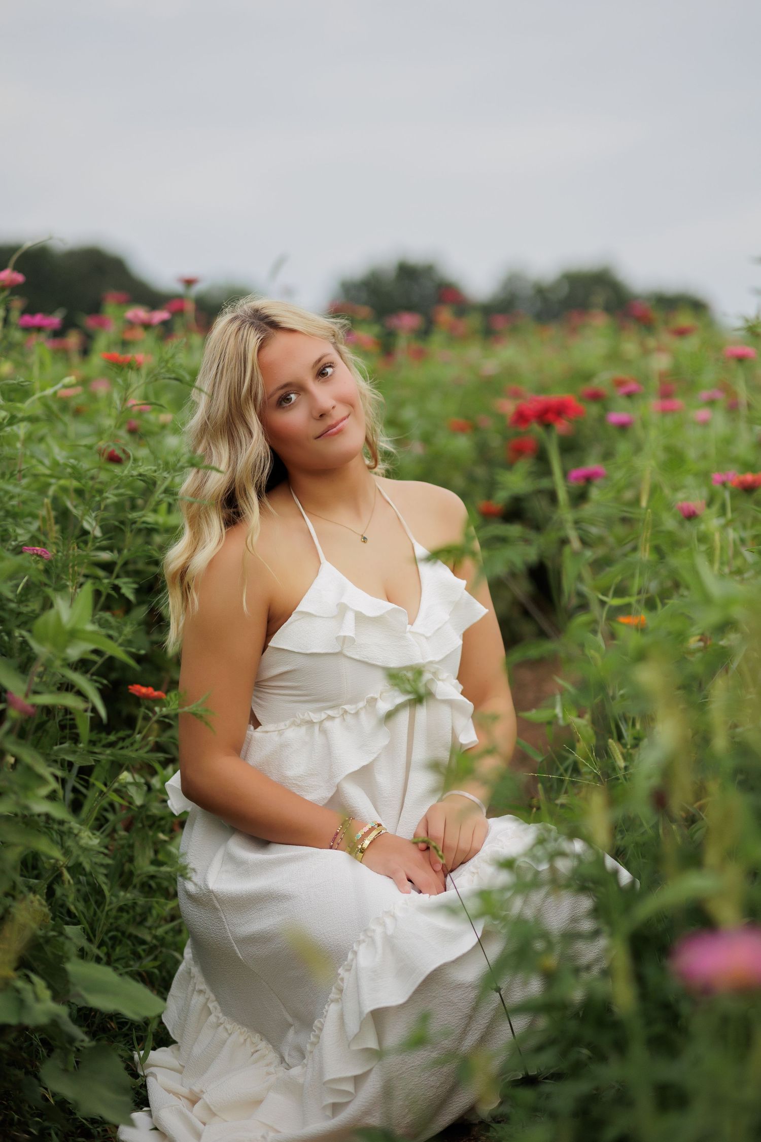 Wake Forest Senior Photography in a flower field at Dix Park in Raleigh, NC