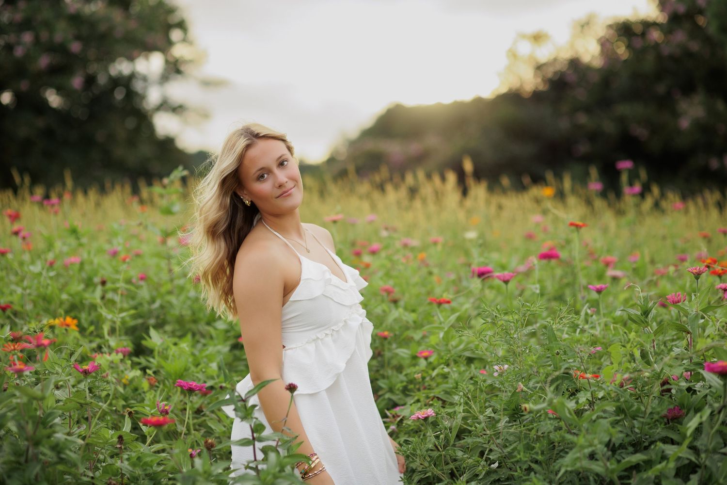 Wake Forest Senior Photography in a flower field at Dix Park in Raleigh, NC