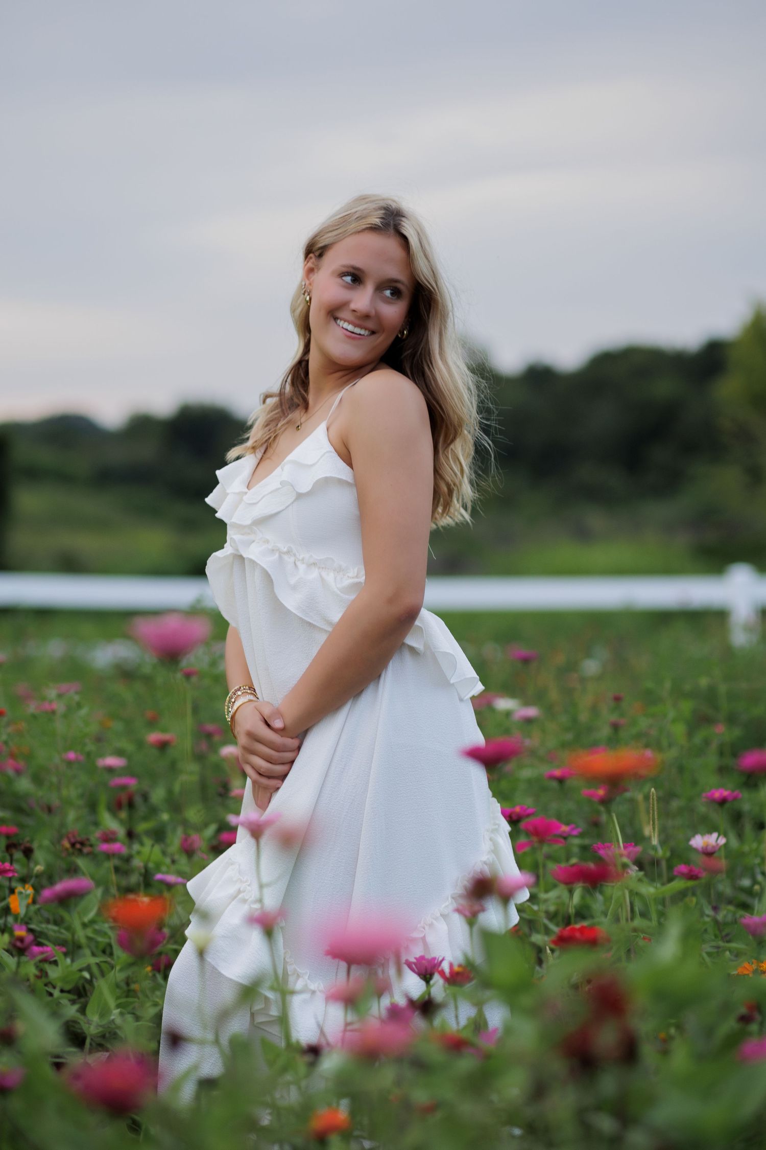 Wake Forest Senior Portraits in a flower field at Dix Park in Raleigh, NC
