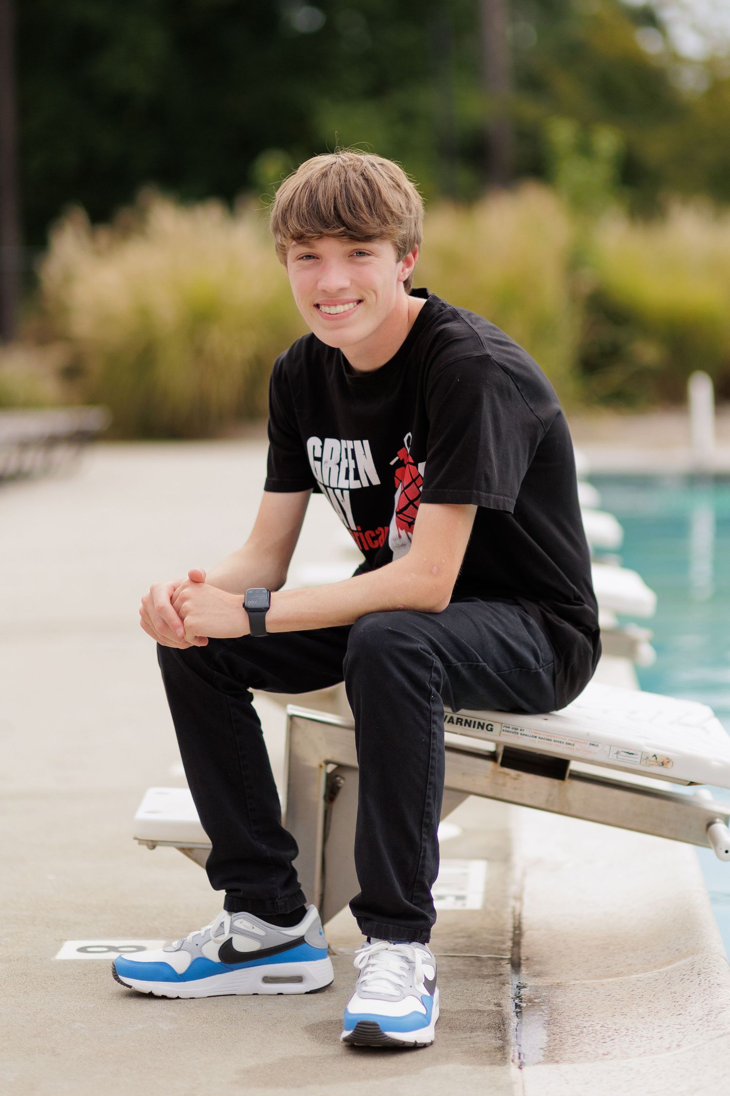 Raleigh Senior Portraits at Brier Creek Country Club Pool Lifeguard