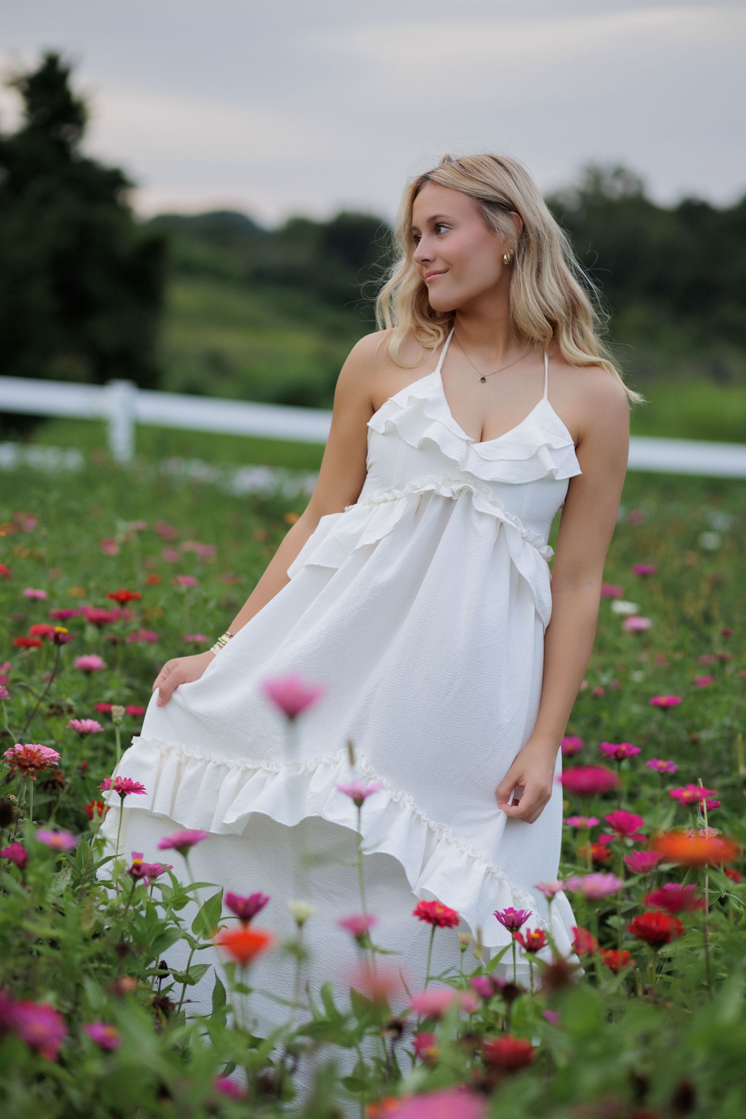 Wake Forest Senior Portraits in a flower field at Dix Park in Raleigh, NC