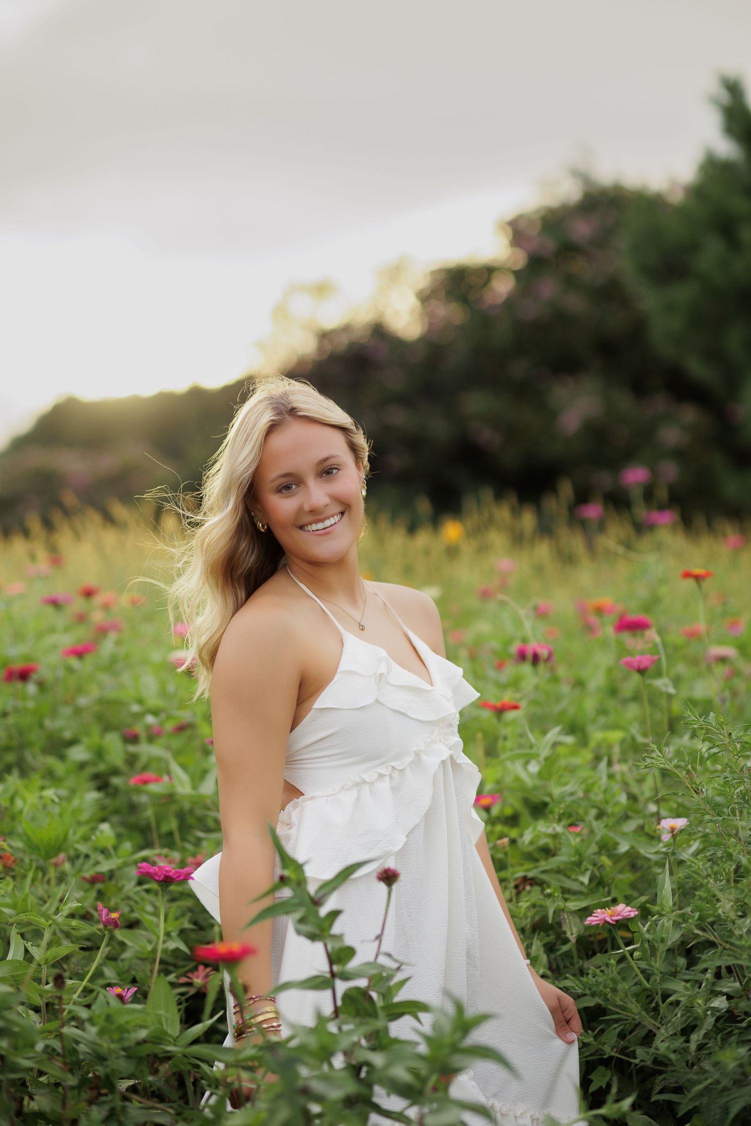 Wake Forest Senior Photography in a flower field at Dix Park in Raleigh, NC