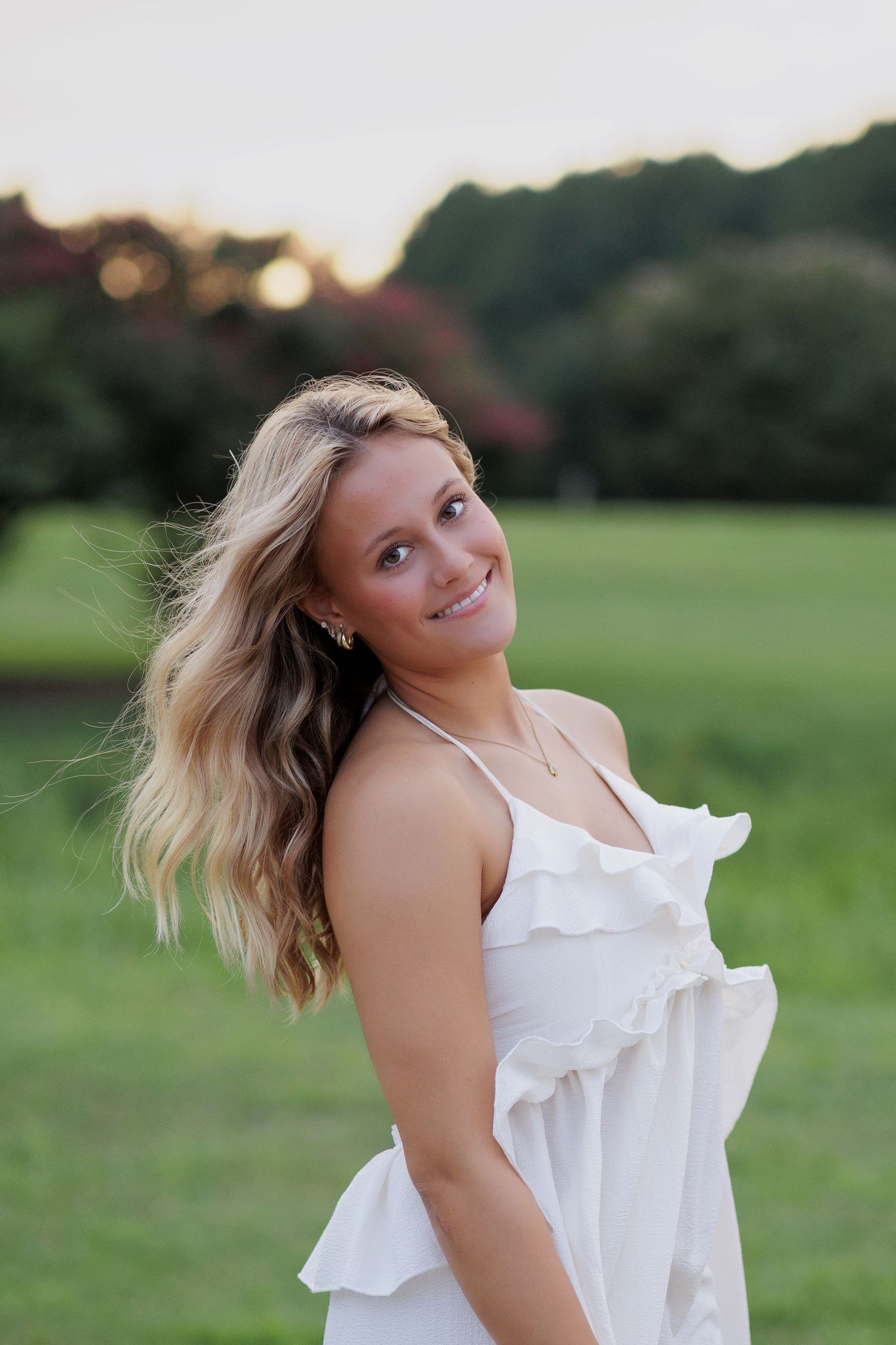 Wake Forest Senior Portraits at Dix Park in Raleigh, NC at Sunset
