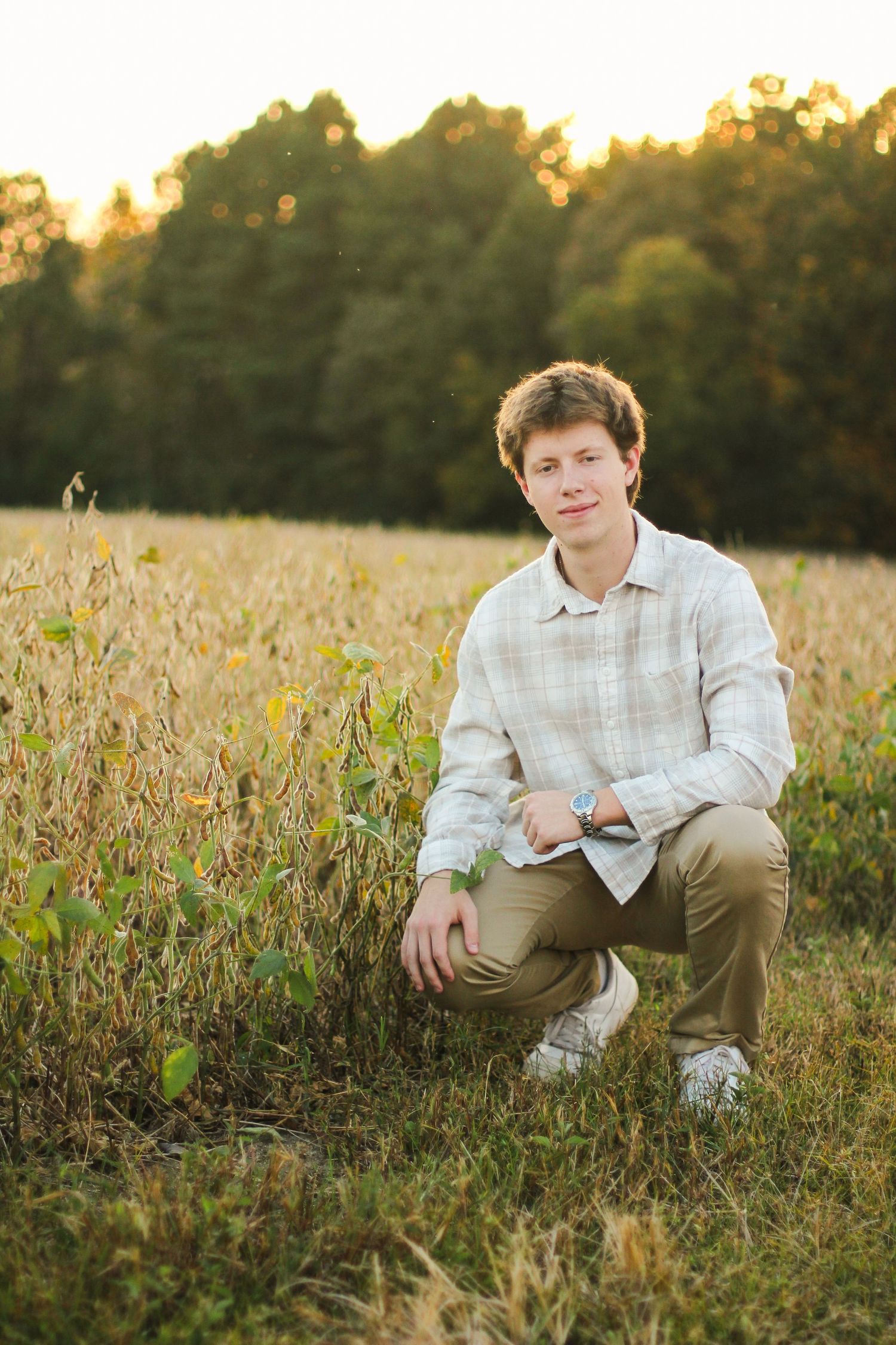 High School Senior Portraits in an open field in Wake Forest, NC