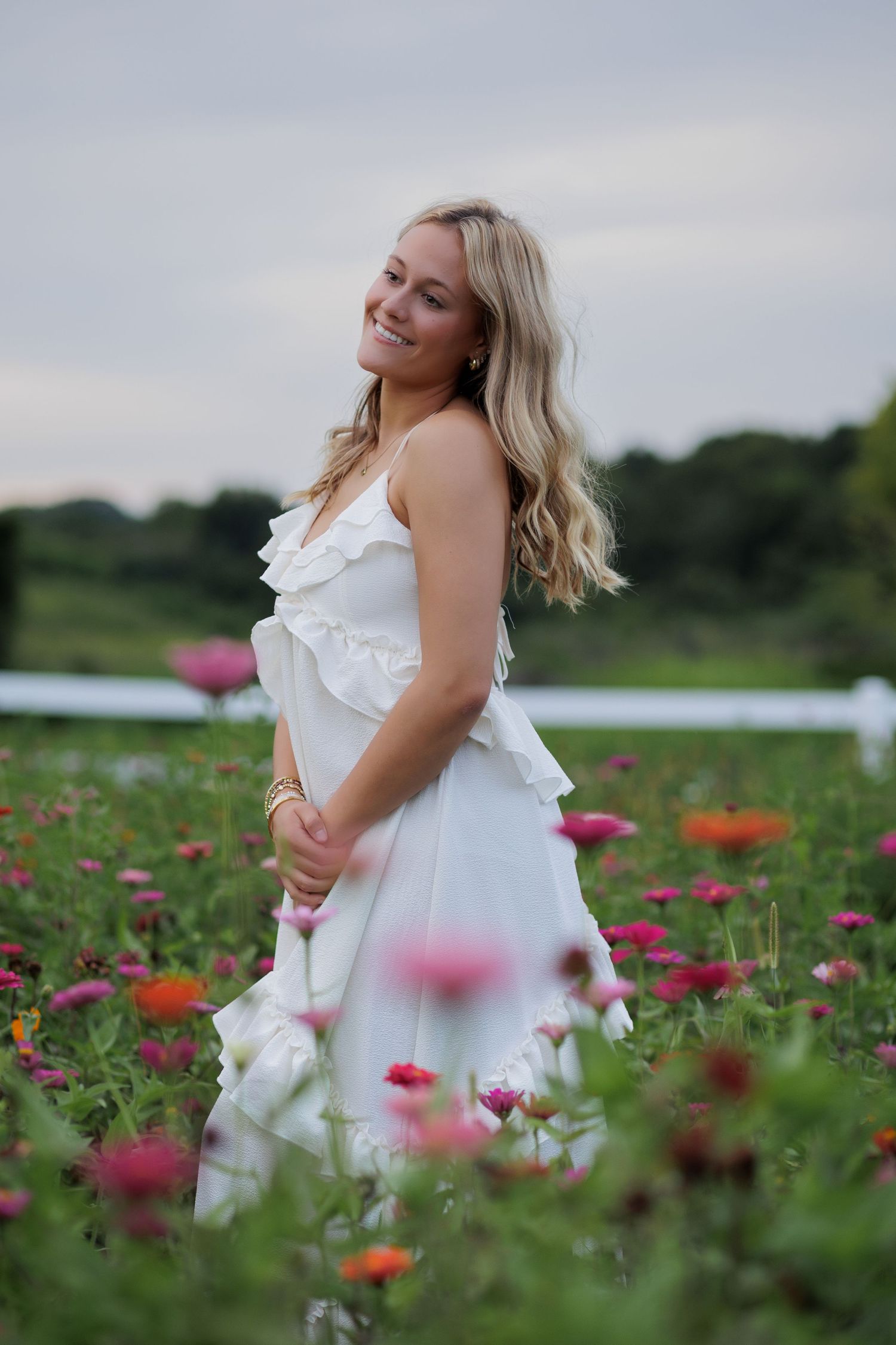 Wake Forest Senior Portraits in a flower field at Dix Park in Raleigh, NC