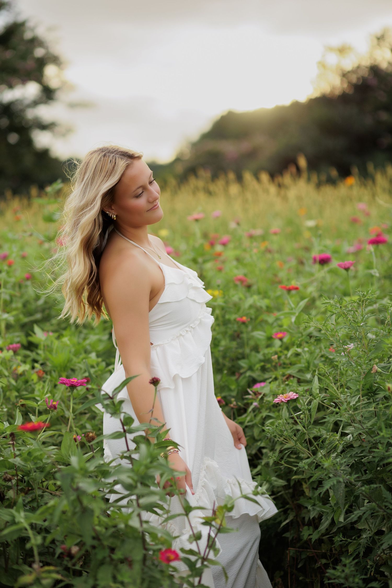 Wake Forest Senior Photography in a flower field at Dix Park in Raleigh, NC