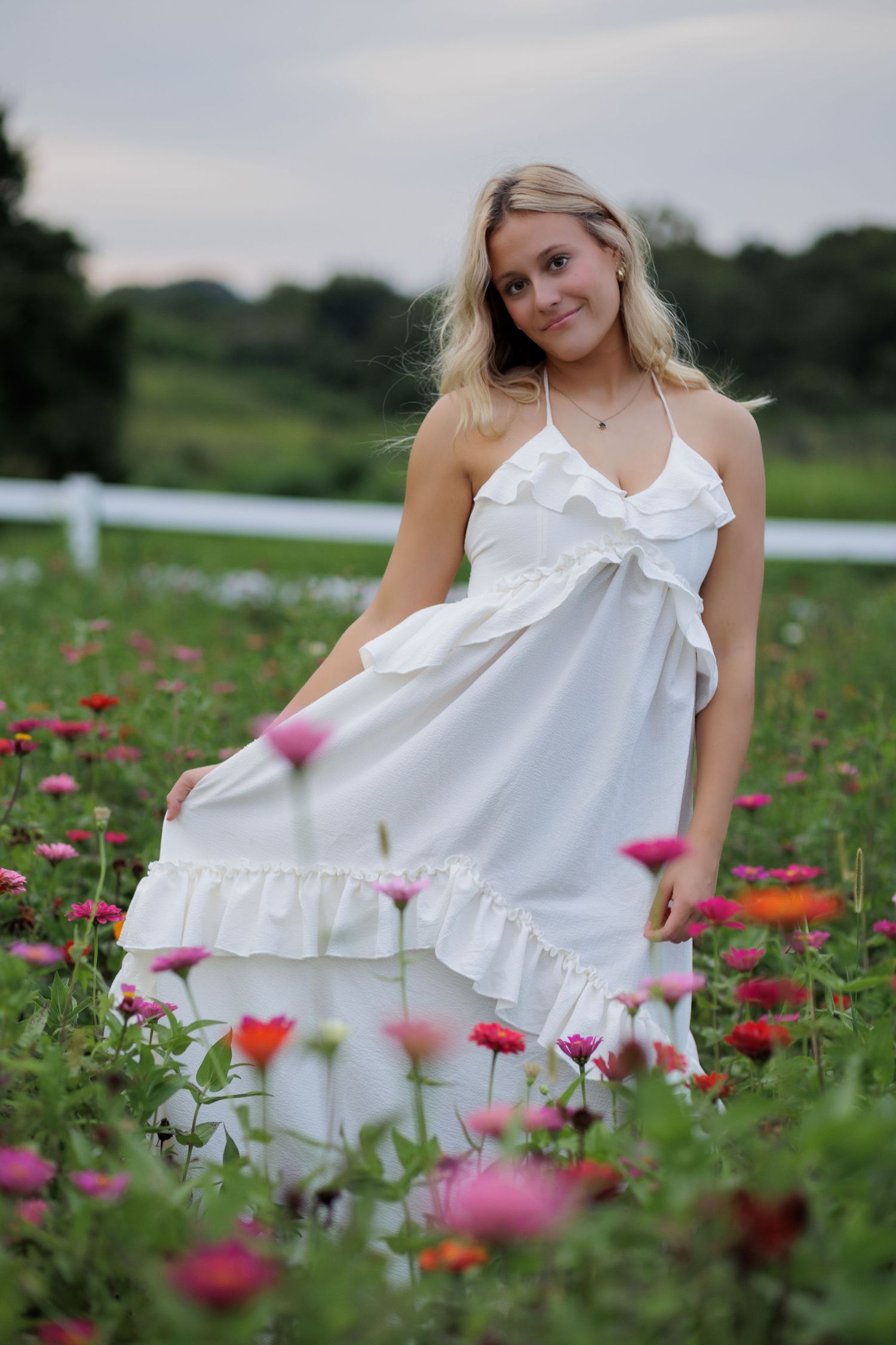 Wake Forest Senior Portraits in a flower field at Dix Park in Raleigh, NC