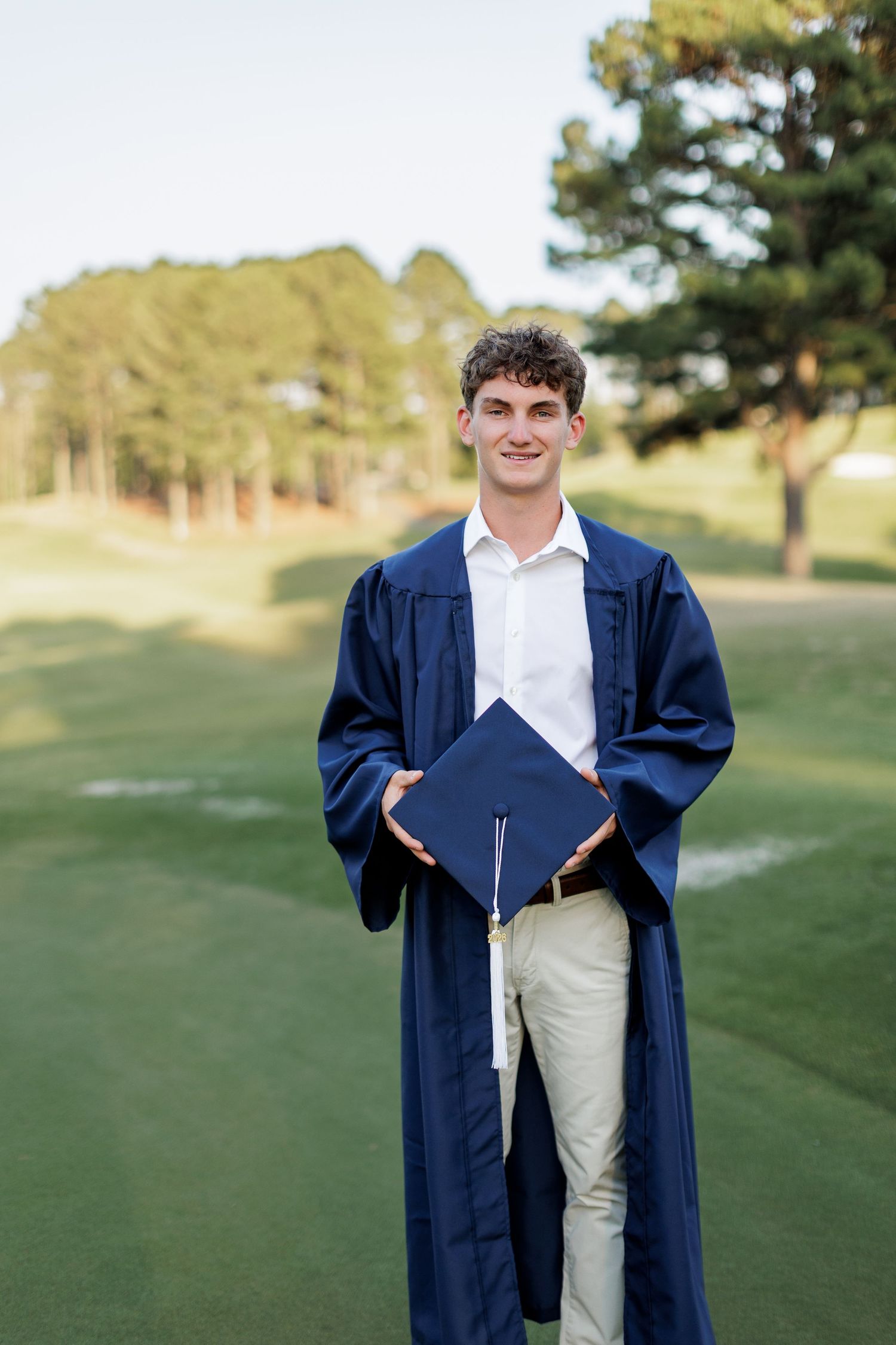 Wake Forest Senior Cap & Gown Session at Heritage Golf Course in Wake Forest, NC.